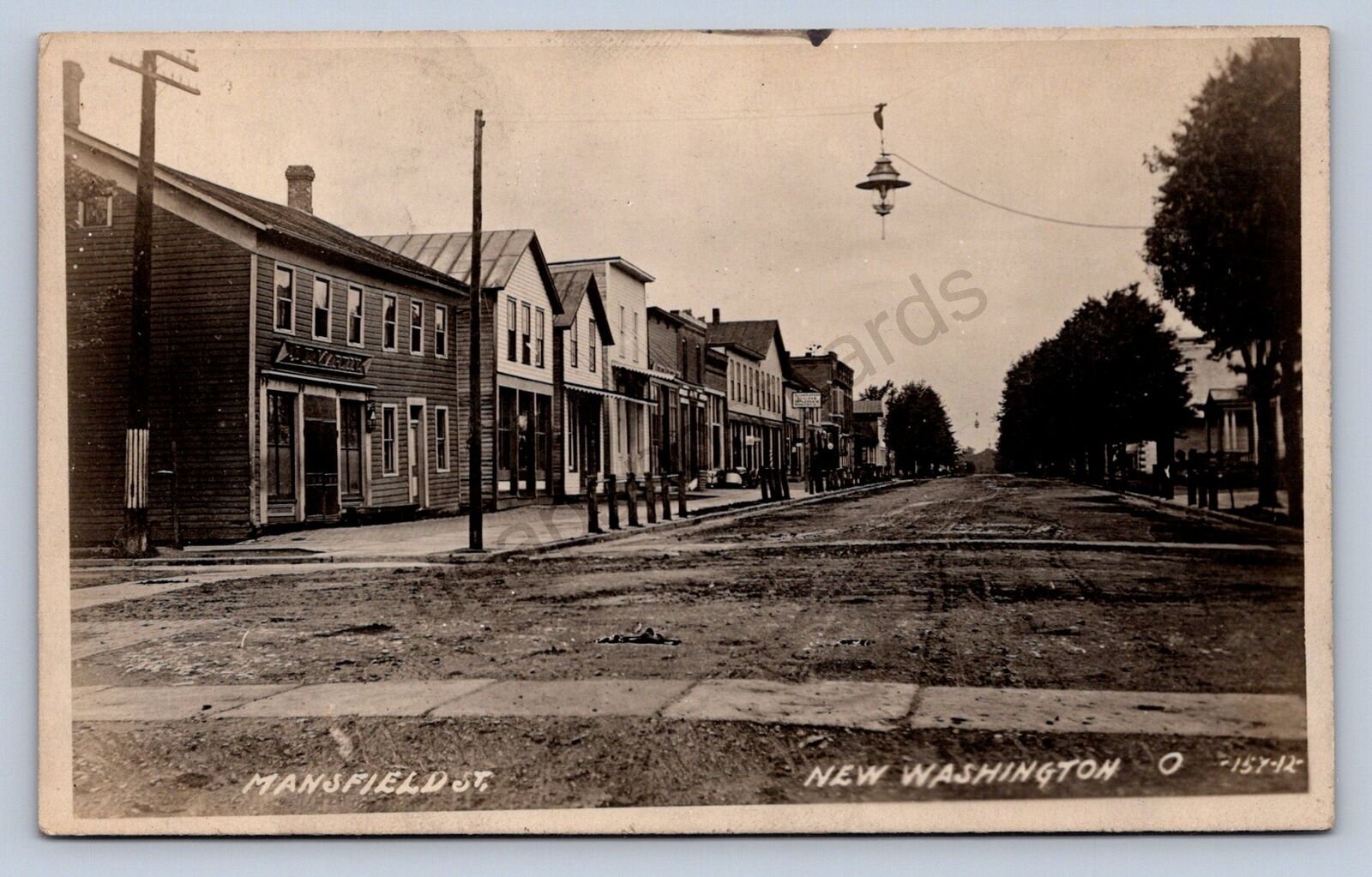 J87/ New Washington Ohio RPPC Postcard c1910 Mansfield Street Stores 105