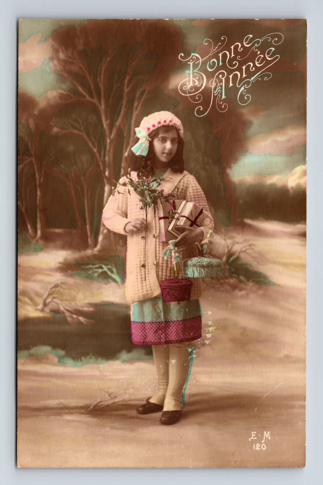 c1915 RPPC French Girl Bonne Annee Gifts Flower Bouquet Hand Tinted Postcard