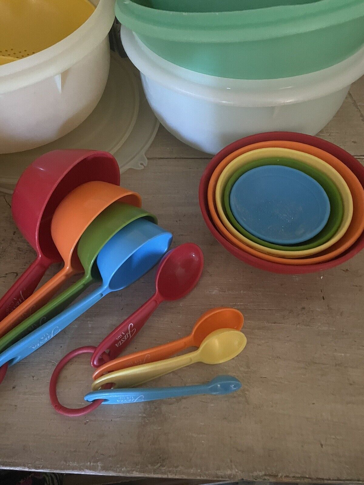 Lot Of Fiesta ware Measuring Cups, Spoons &  Bowls
