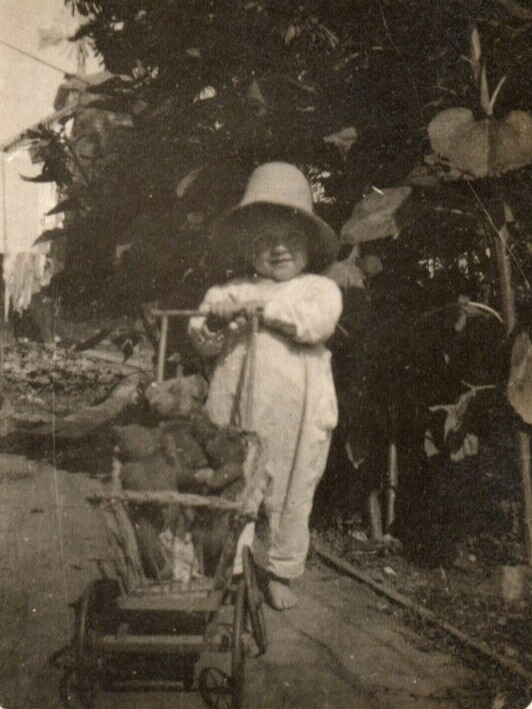 C.1910 RPPC GIRL IN PAJAMAS SUNHAT WHEELING HER TEDDY BEAR & DOLL Postcard P10