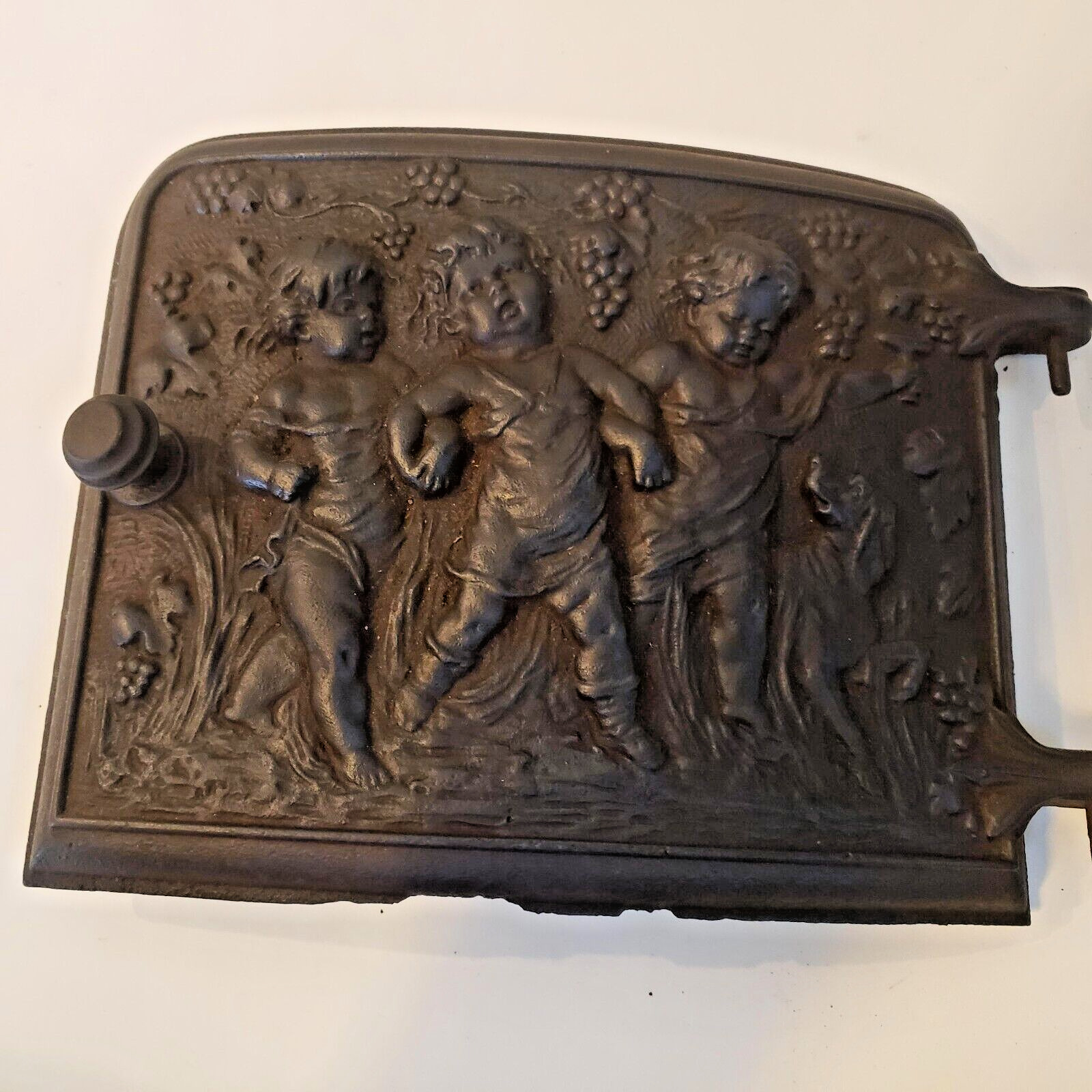 Old Cast Iron Ornate Curved Stove Door  - Three Cherubs and Dog