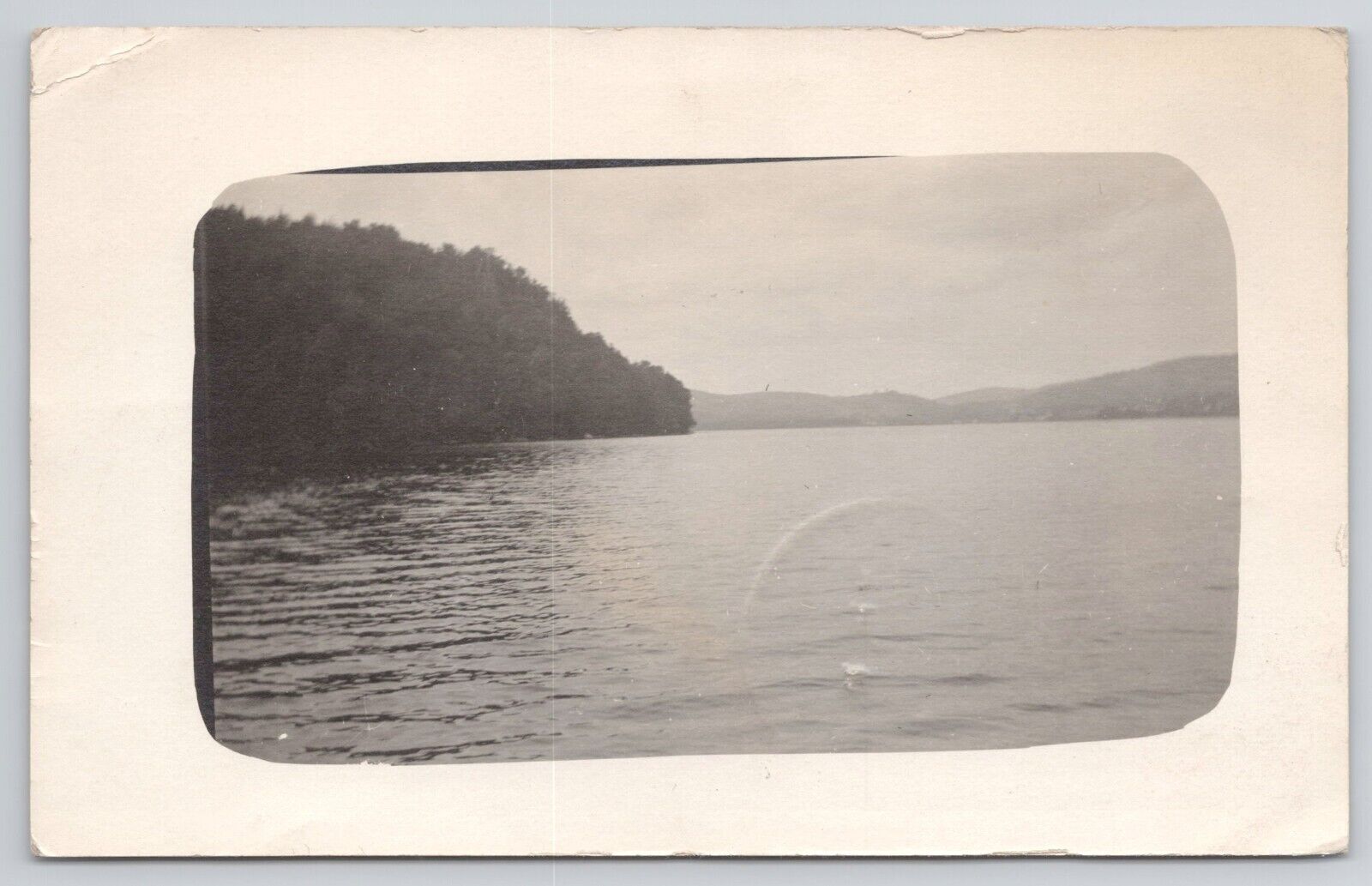 Postcard RPPC Photo of a Lake Taken from a Boat c1912