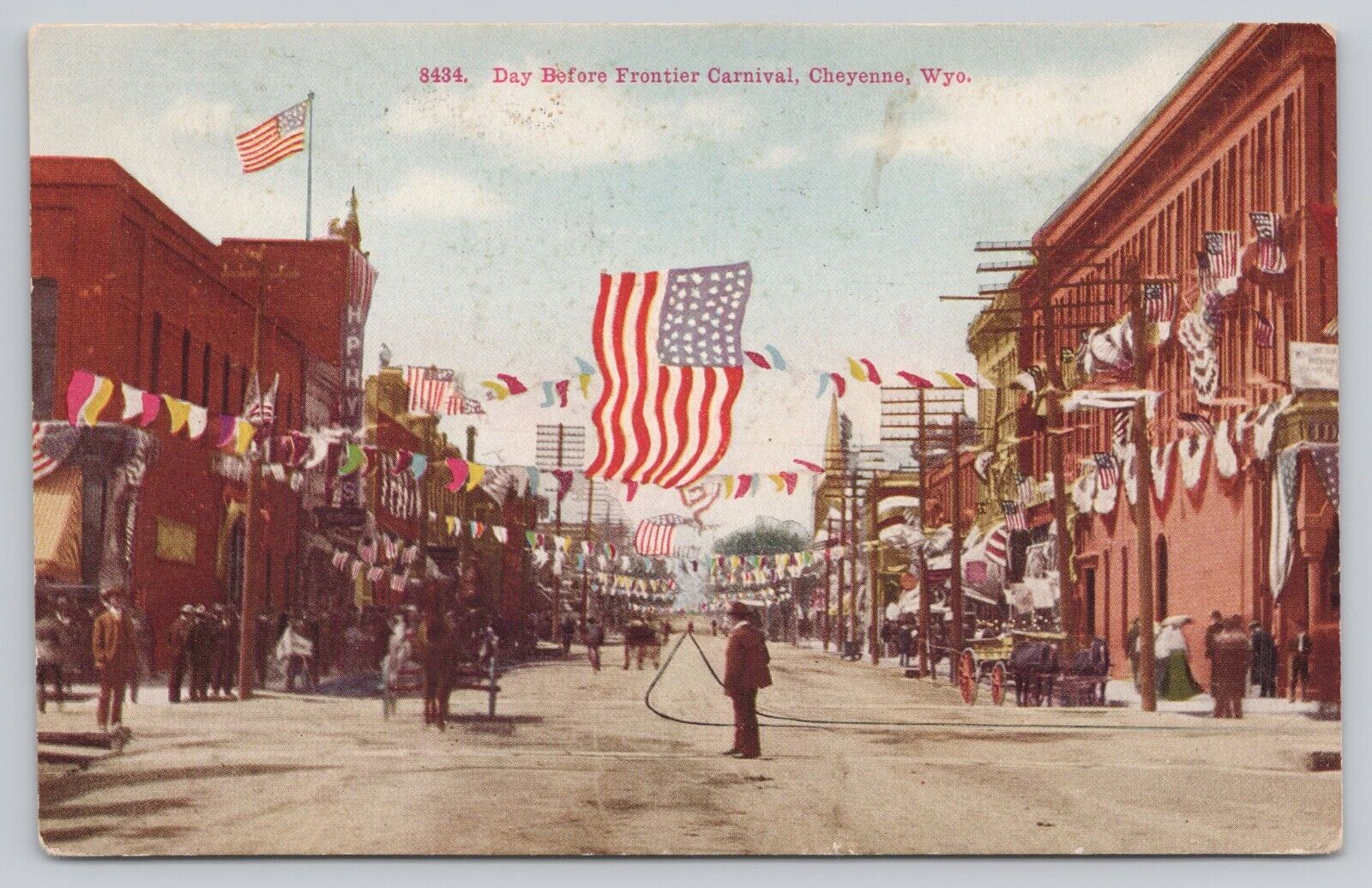 Cheyenne Wyoming Frontier Carnival Flags Storefronts Decorations Postcard 1910