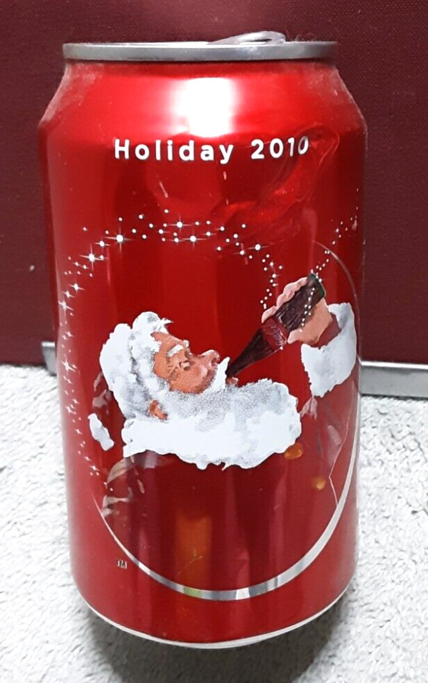 2010 Coca Cola Holiday Santa Claus Soda can opened
