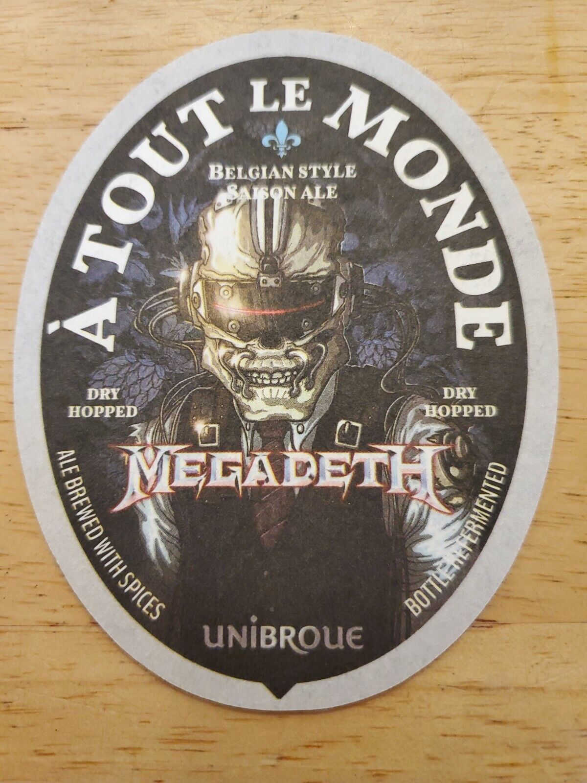 A TOUT LE MONDE BELGIAN ALE Beer COASTER MAT Unibroue Quebec CANADA Megadeth