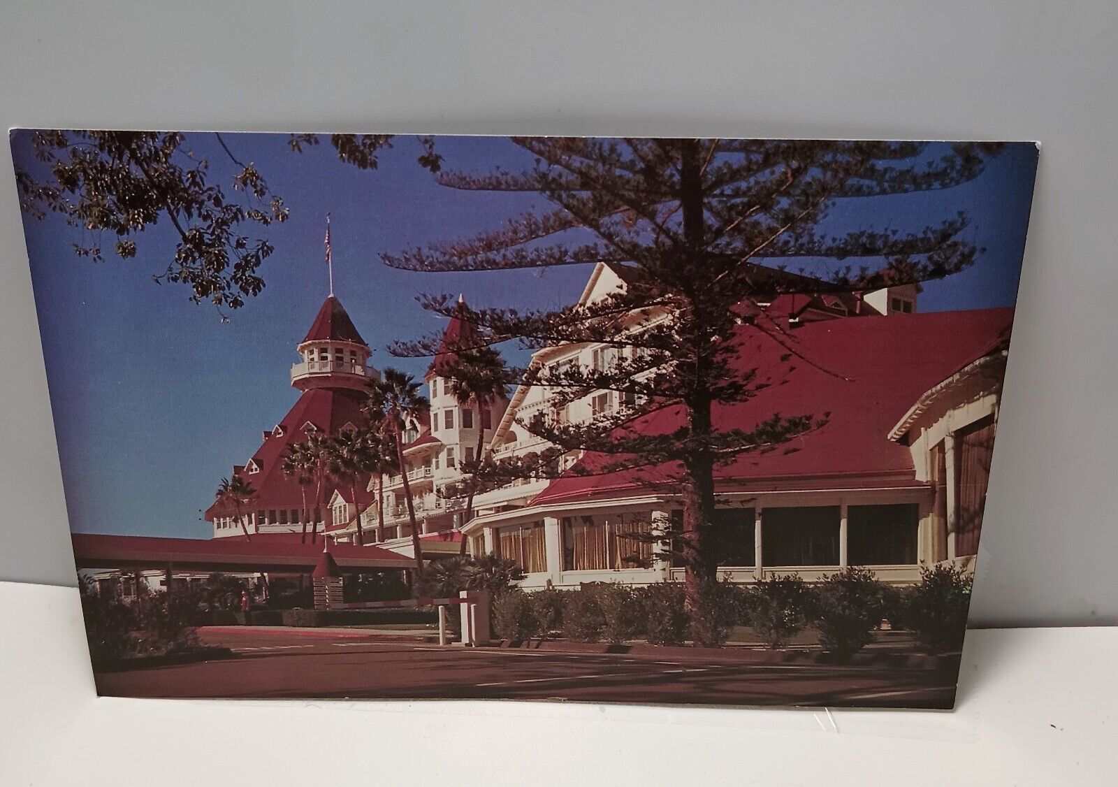 Postcard Hotel del Coronado foregound is exterior of famed Crown Room Ca.B-1