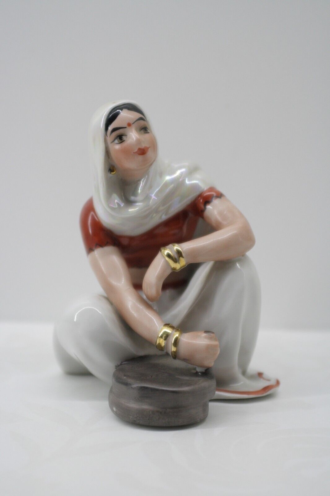 Vintage porcelain statuette USSR, Indian woman with millstones Kyiv, Soviet Time