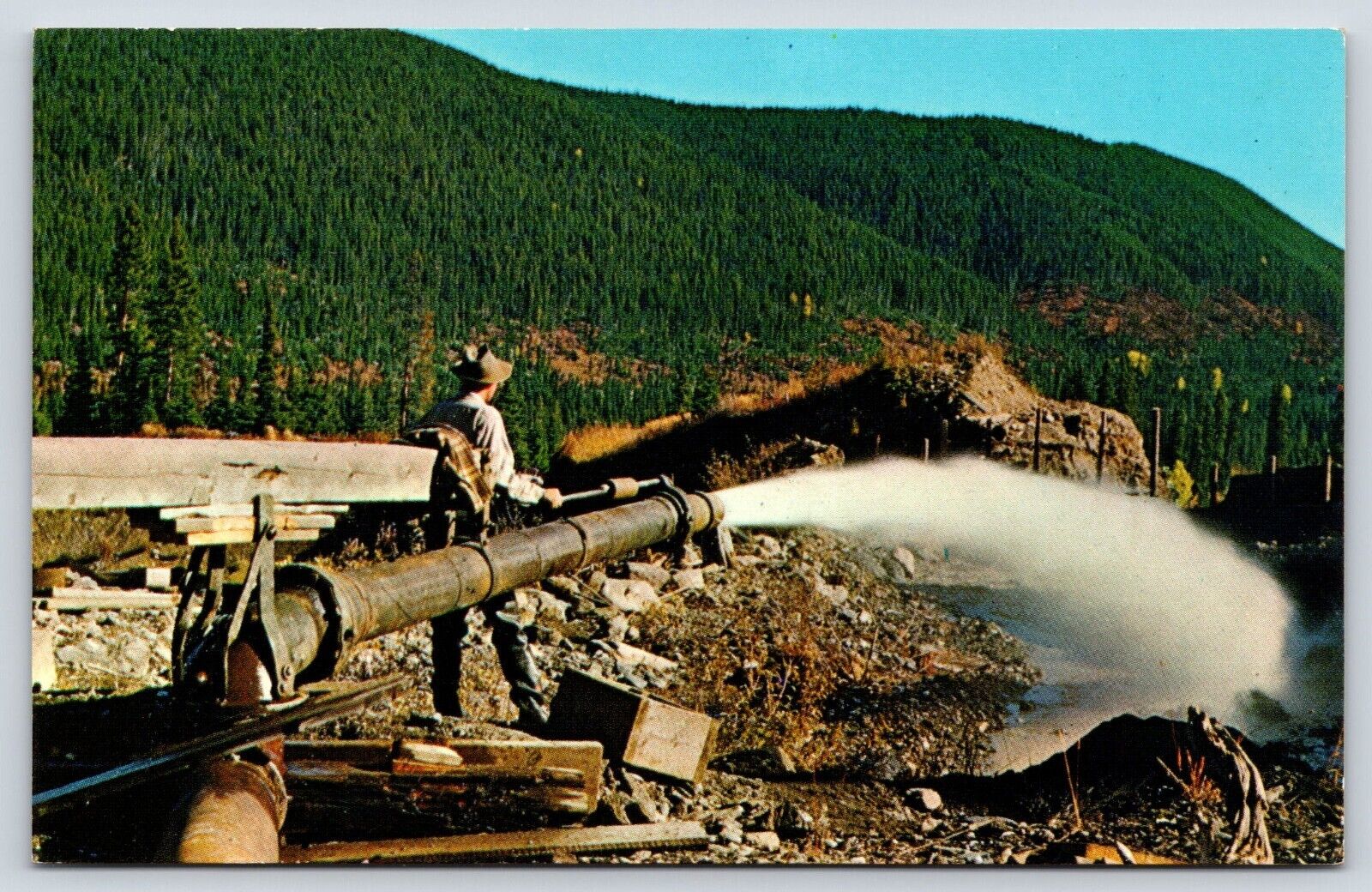 Canada Barkerville BC Piping With Giant Monitor Vintage Postcard