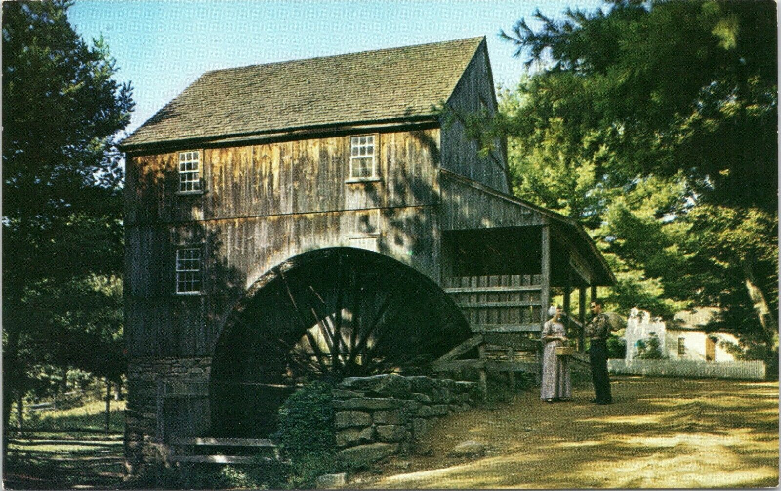 Old Sturbridge Village Massachusetts - Grist Mill - man and woman talking