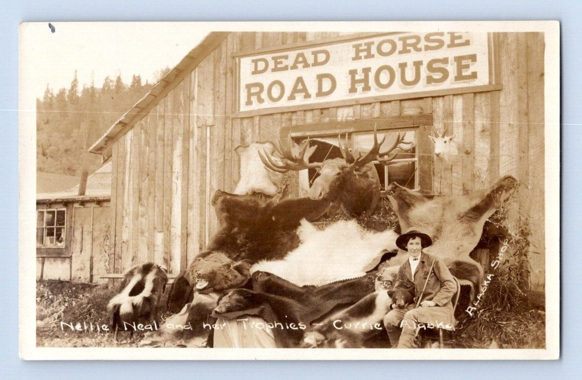 RPPC 1910. DEAD HORSE ROAD HOUSE. NELLIE NEAL TAXIDERMY. ALASKA. POSTCARD L28
