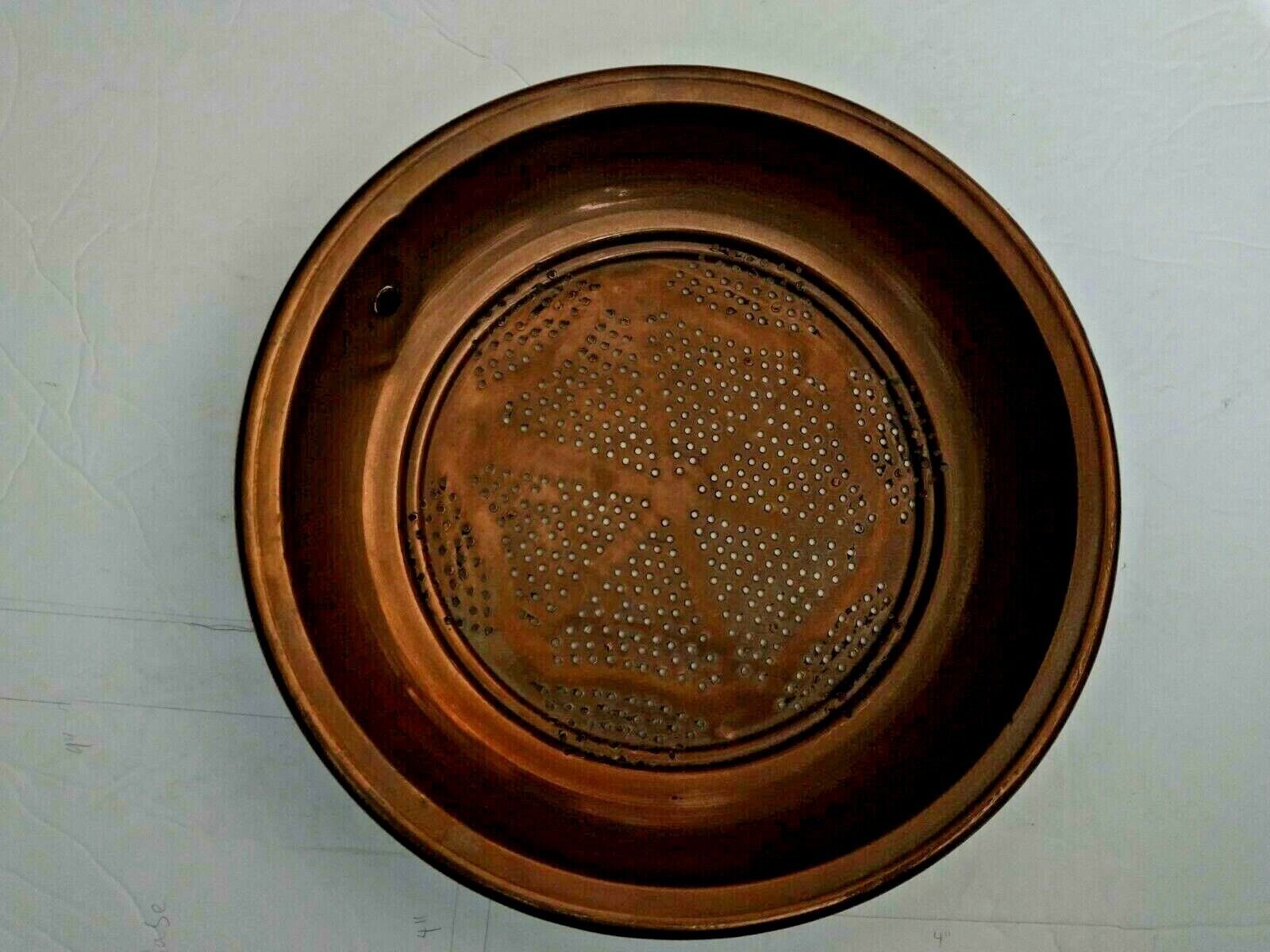 Copper strainer  or colandor  with attached metal  ring