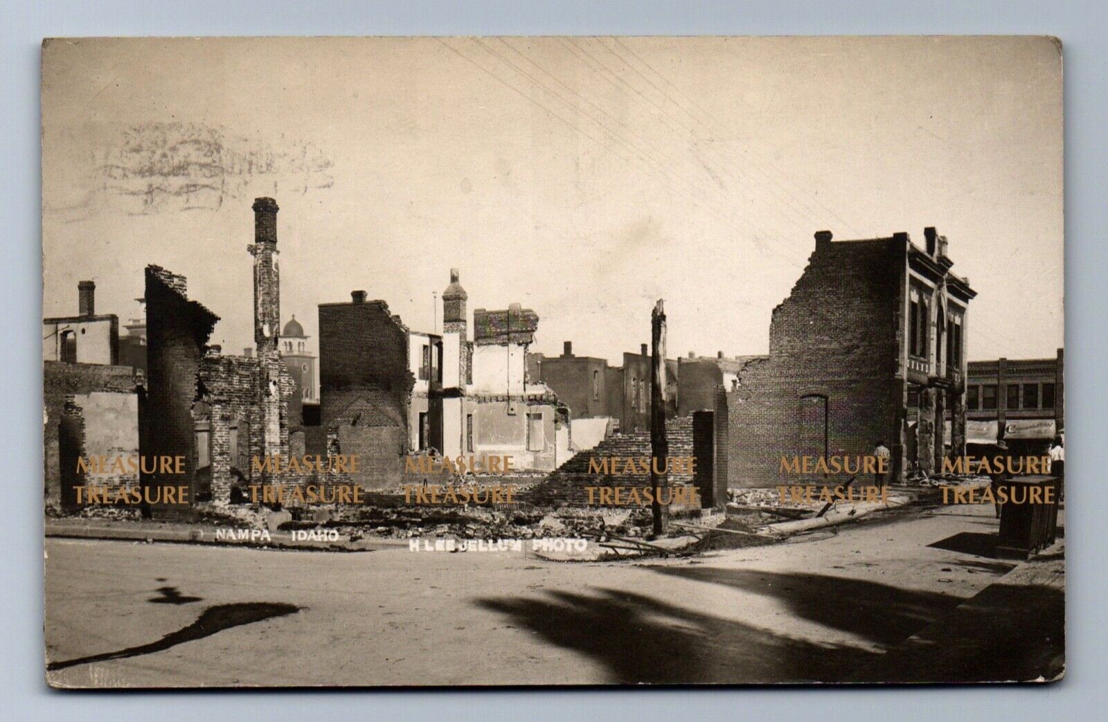 1909 RPPC GREAT FIRE NAMPA, IDAHO, LEE JELLUM, COSMOPOLITAN BAR Postcard PS