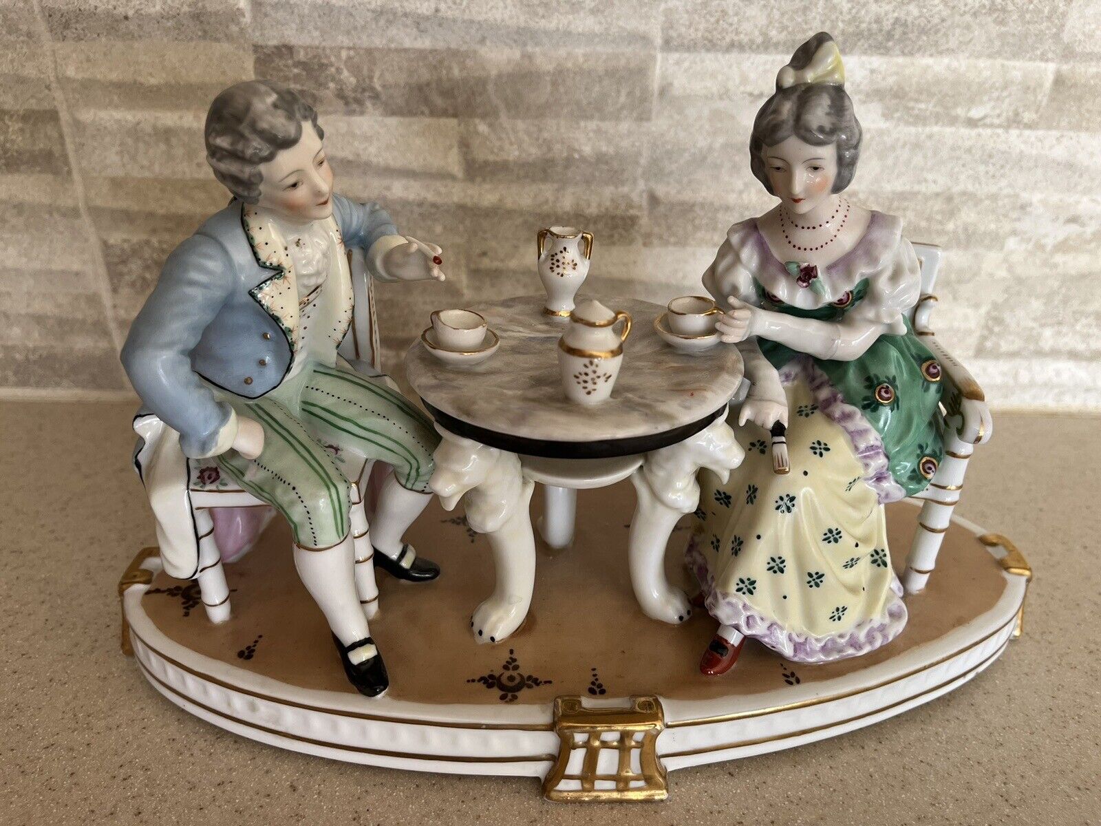 Porcelain Couple Drinking Tea 