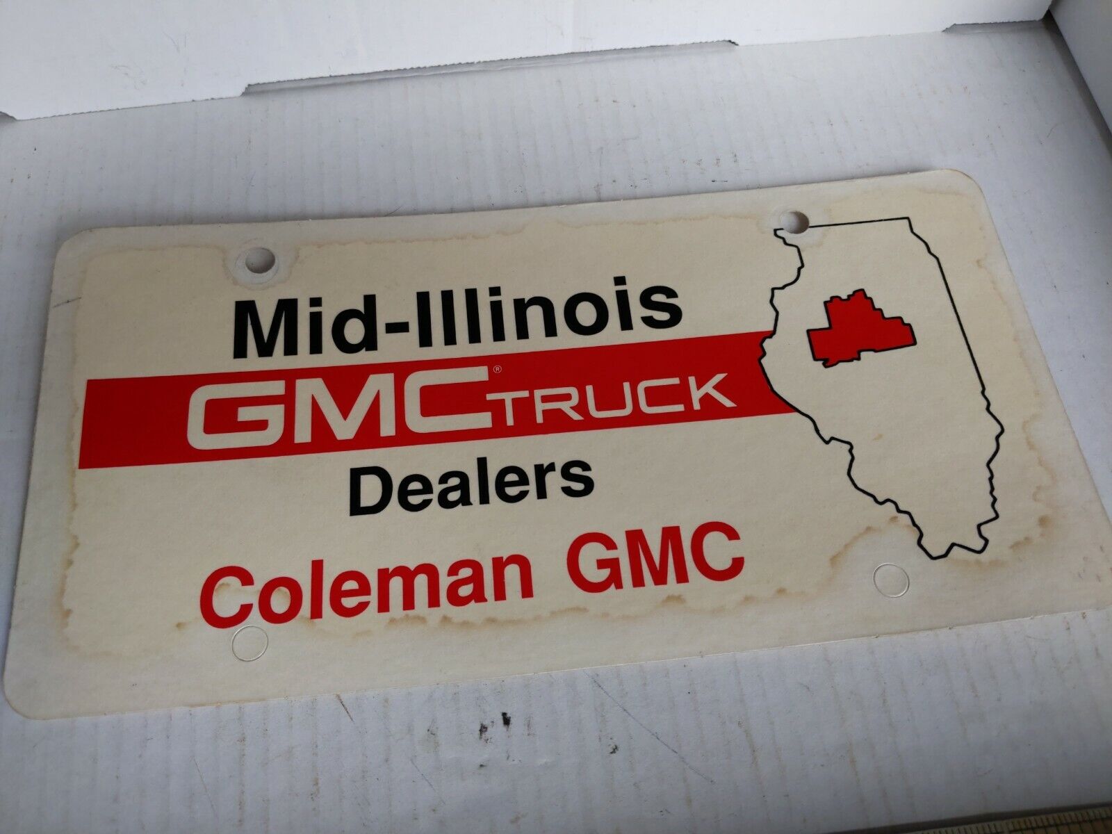 Vntge Coleman GMC mid Illinois advertising License Plate 