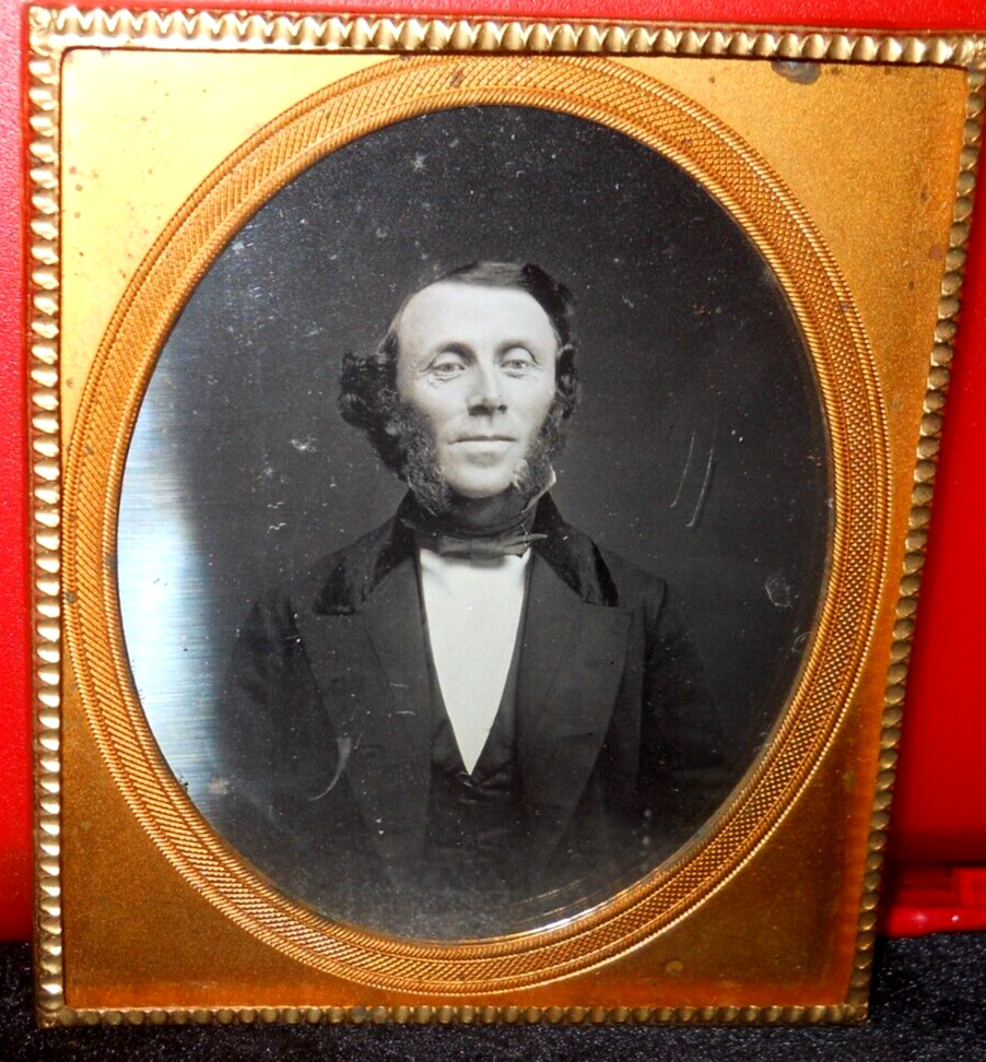 1/6th Size Daguerreotype of younger man in brass mat/frame