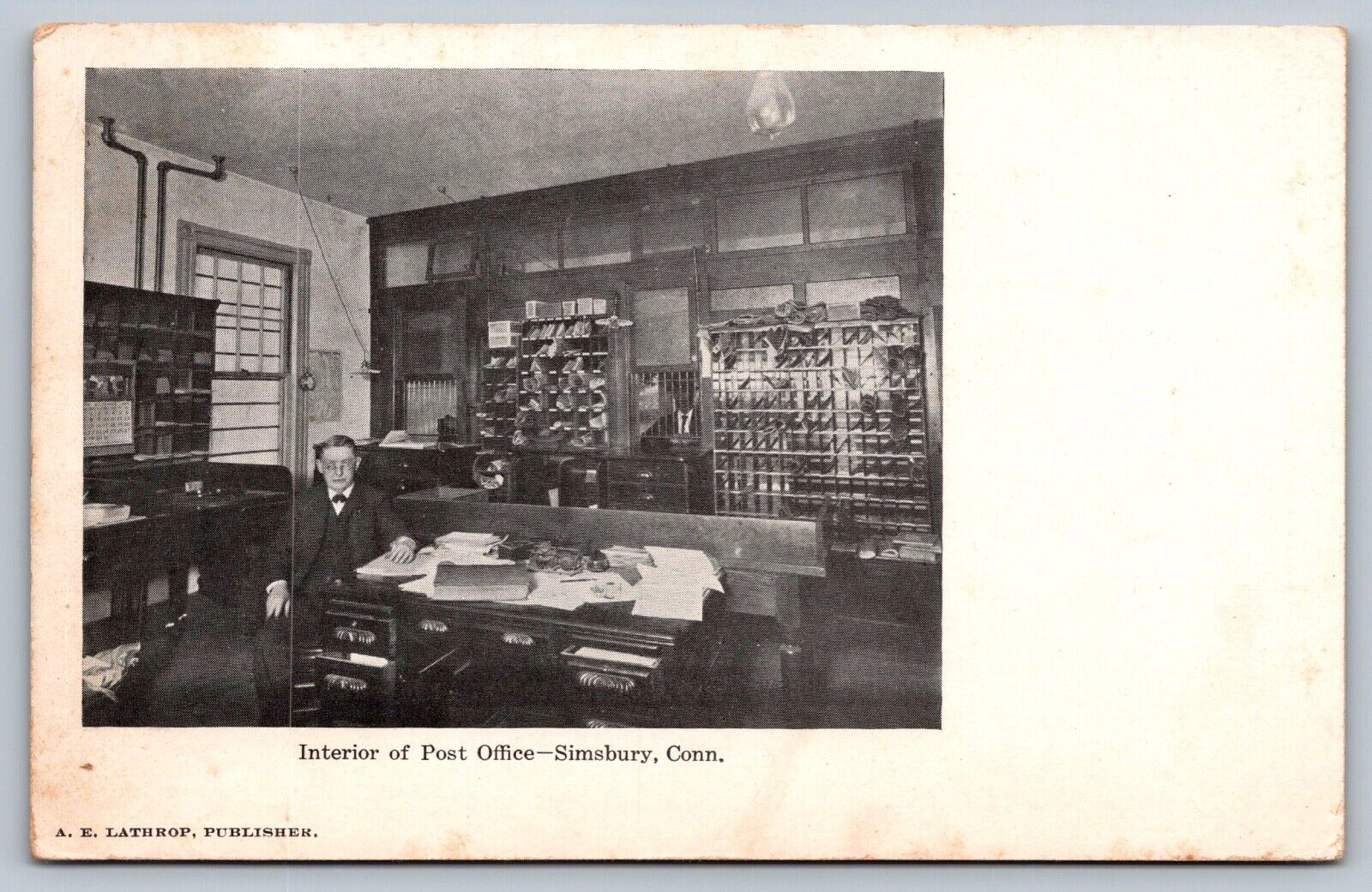 1905 SIMSBURY CONNECTICUT INTERIOR OF POST OFFICE LATHROP PUBLISHER W/WORKER