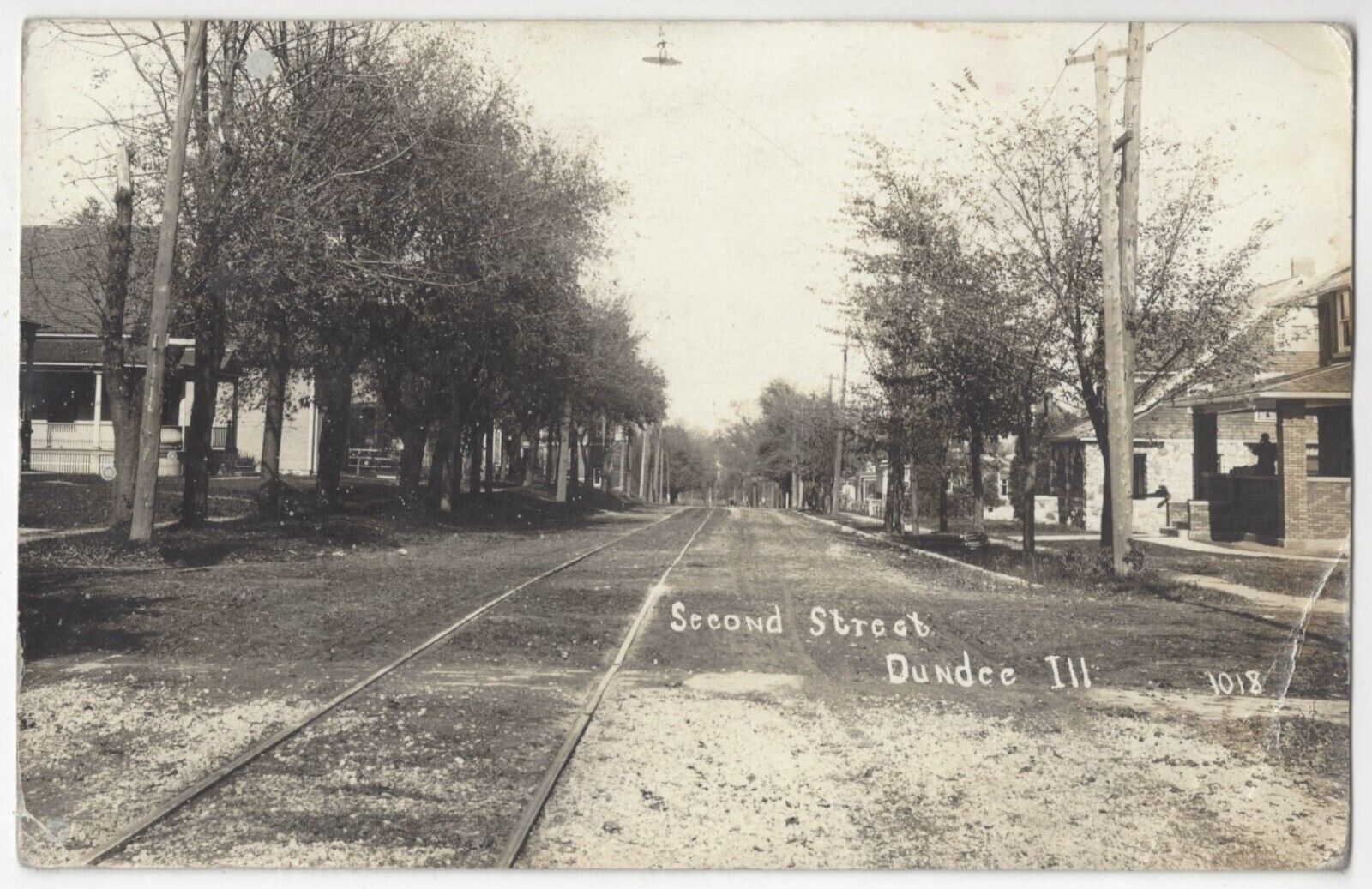 1914 Dundee, Illinois - RPPC Residential Street Scene w/ Railroad Trolley Tracks