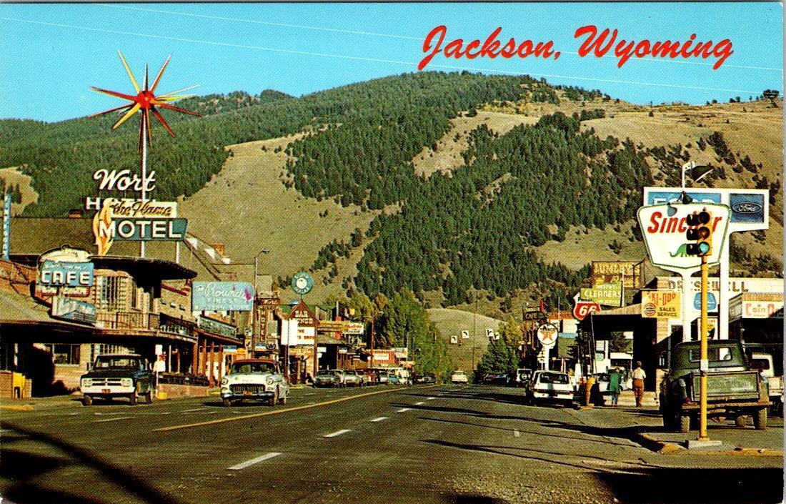 Jackson, WY Wyoming  STREET SCENE Cafe~RoundUp Western Store~50's Car  Postcard