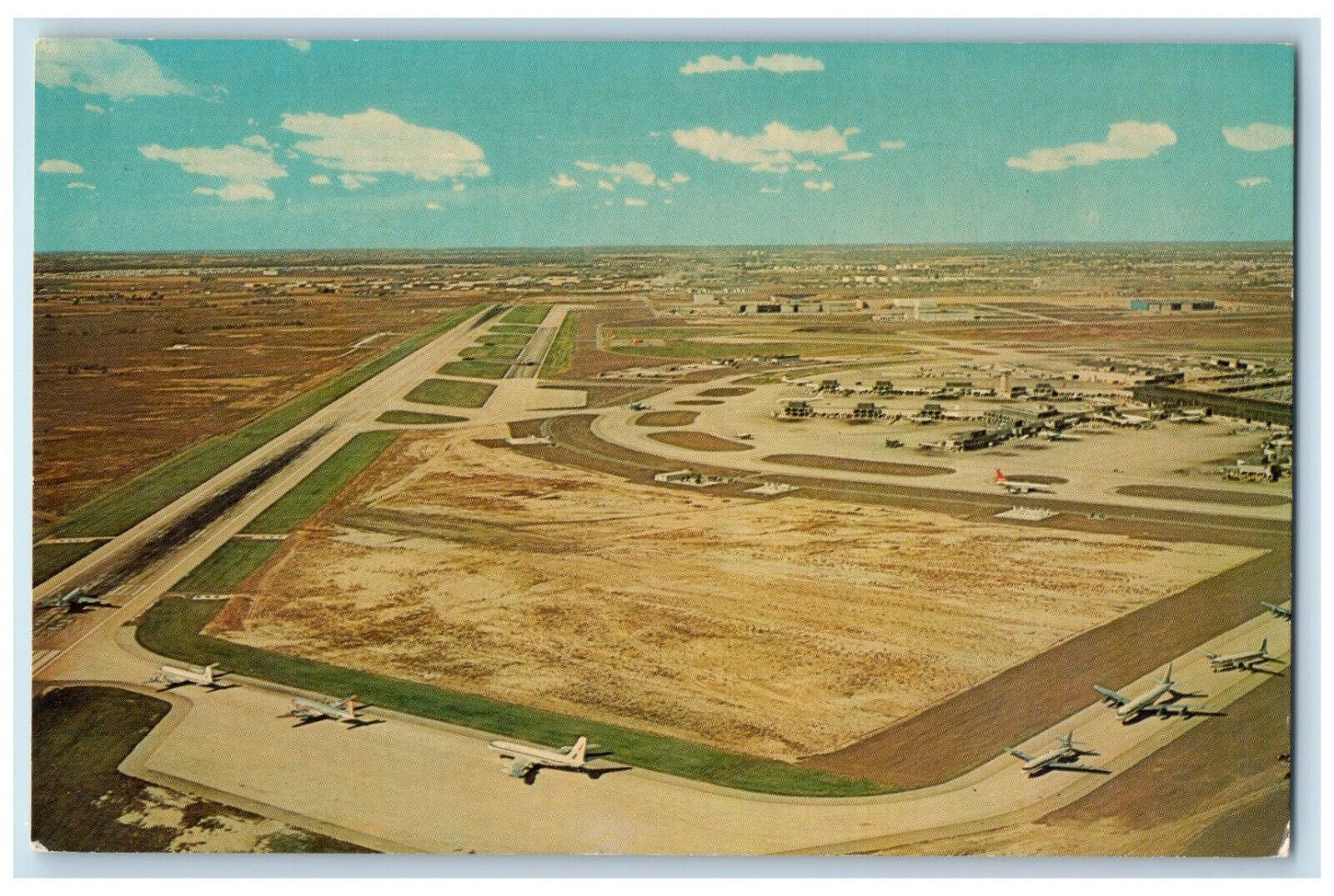 c1960's Airplanes Lined Up Chicago-O'Hare International Airport, IL Postcard