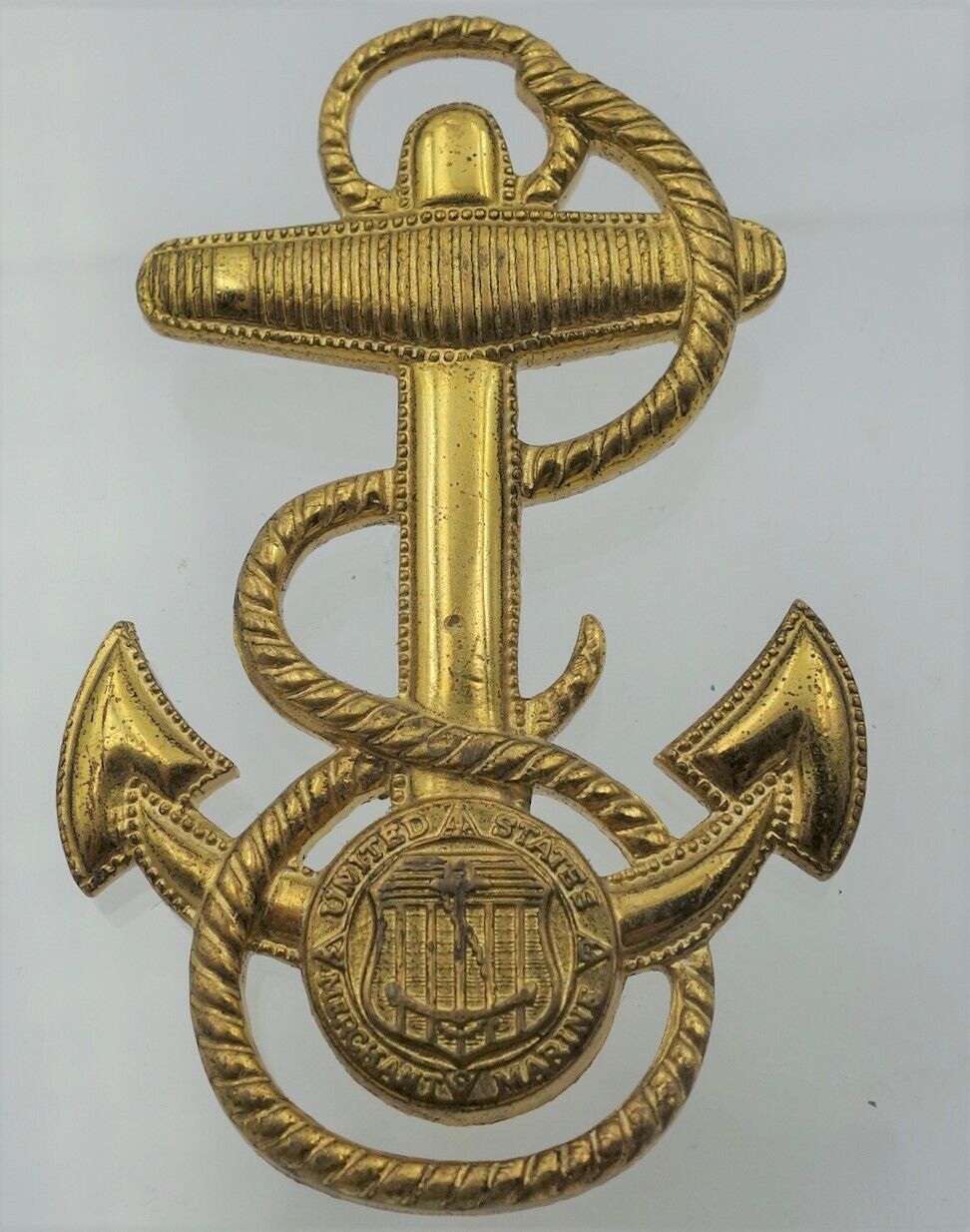 E79, WWII U.S. Merchant Marine Cadet Corps Visor Cap Badge