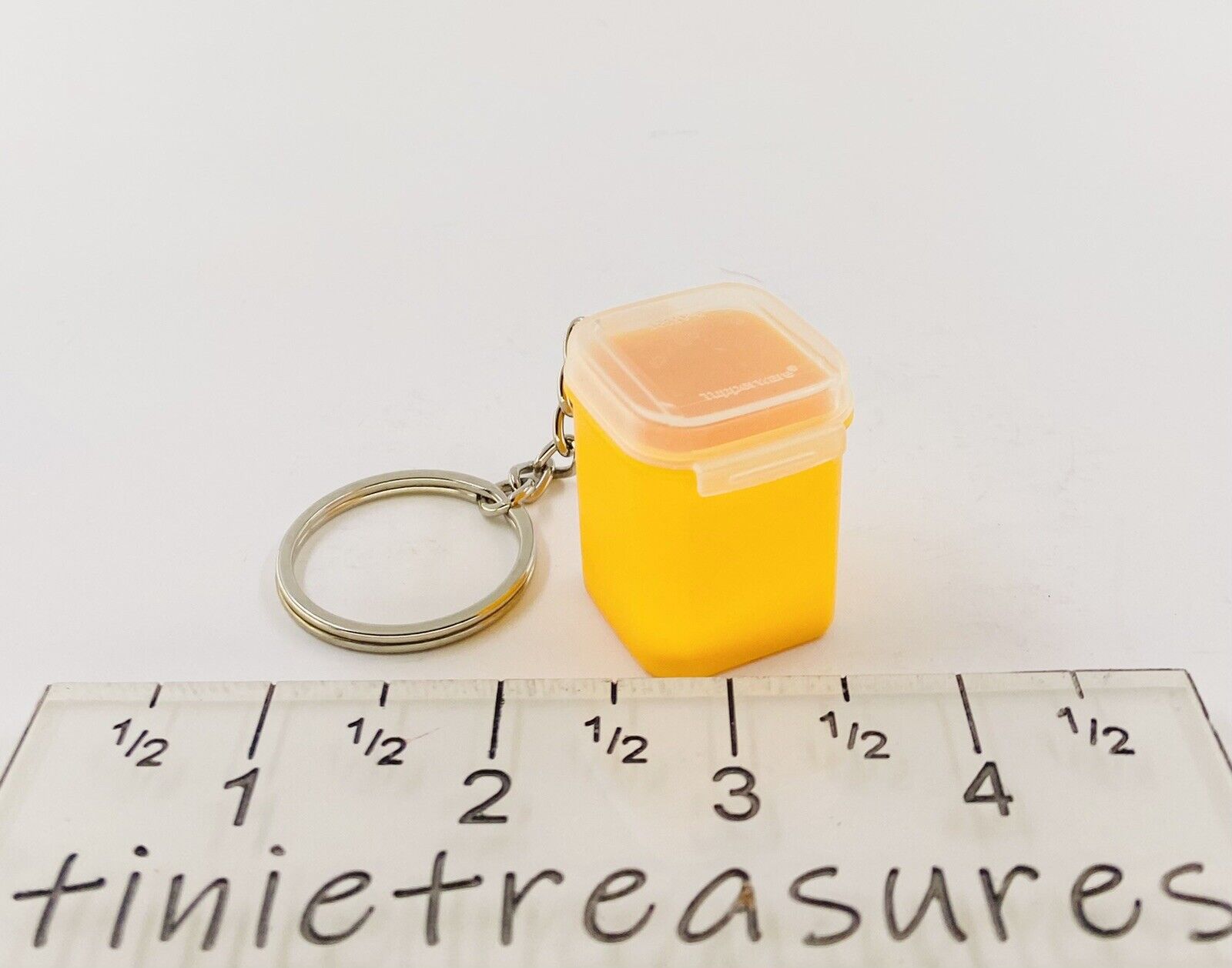 Tupperware mini signature line keychain in apricot with sheer Opening lid New