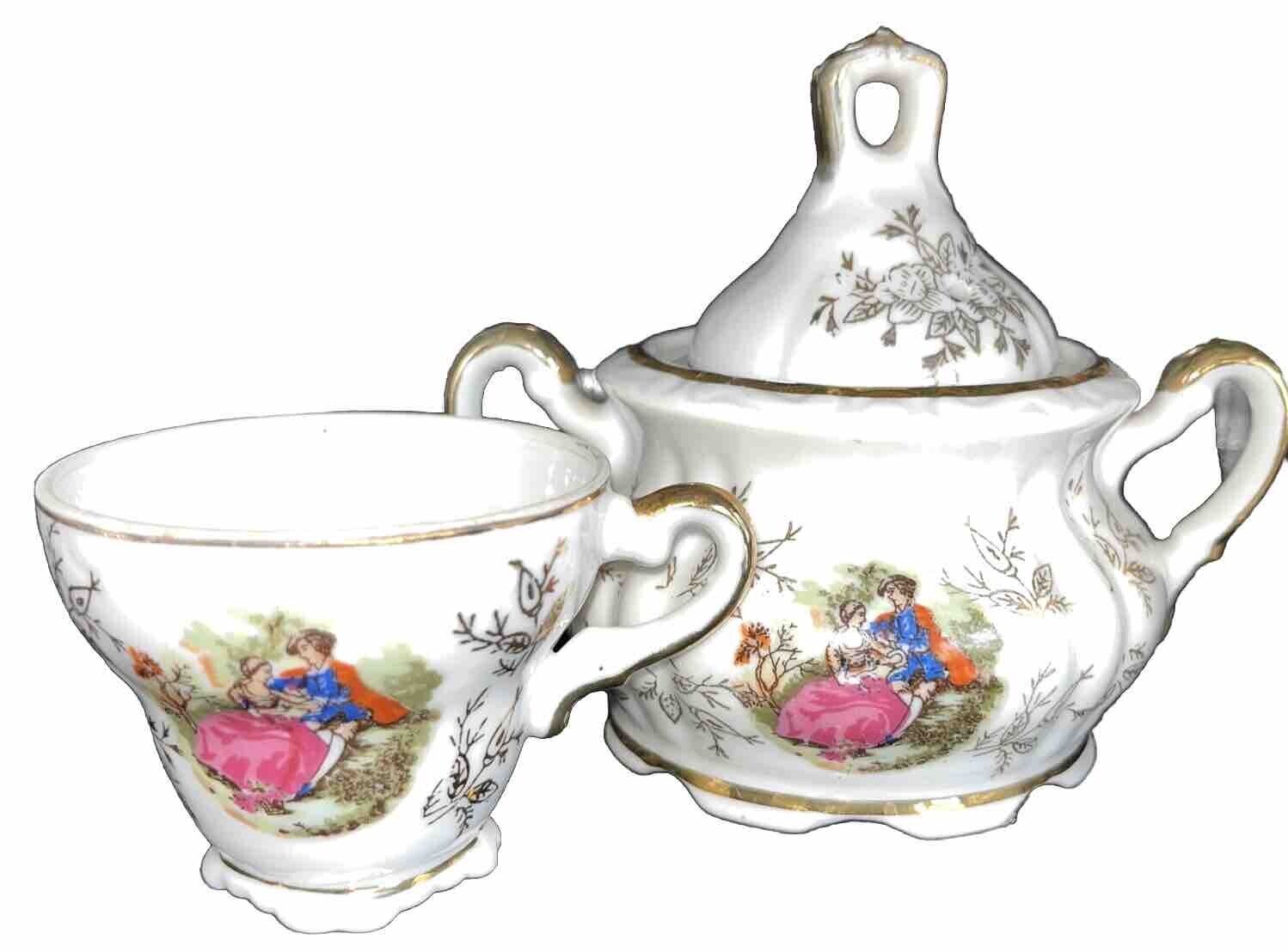 Vintage Sugar Bowl W/ Teacup Colonial couple 