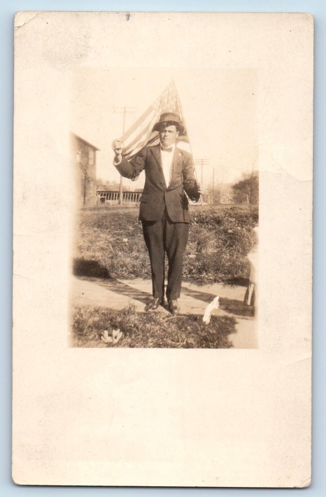 c1910\'s Postcard RPPC Photo Man Holding Flag Scene Field Unposted Antique