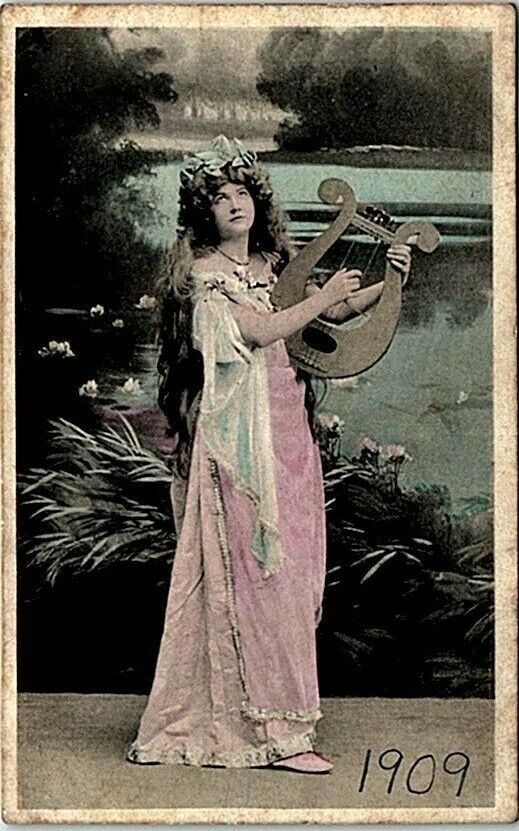 c1900s Real Photo Postcard Lady with small Harp Color Posted Stamp Divided