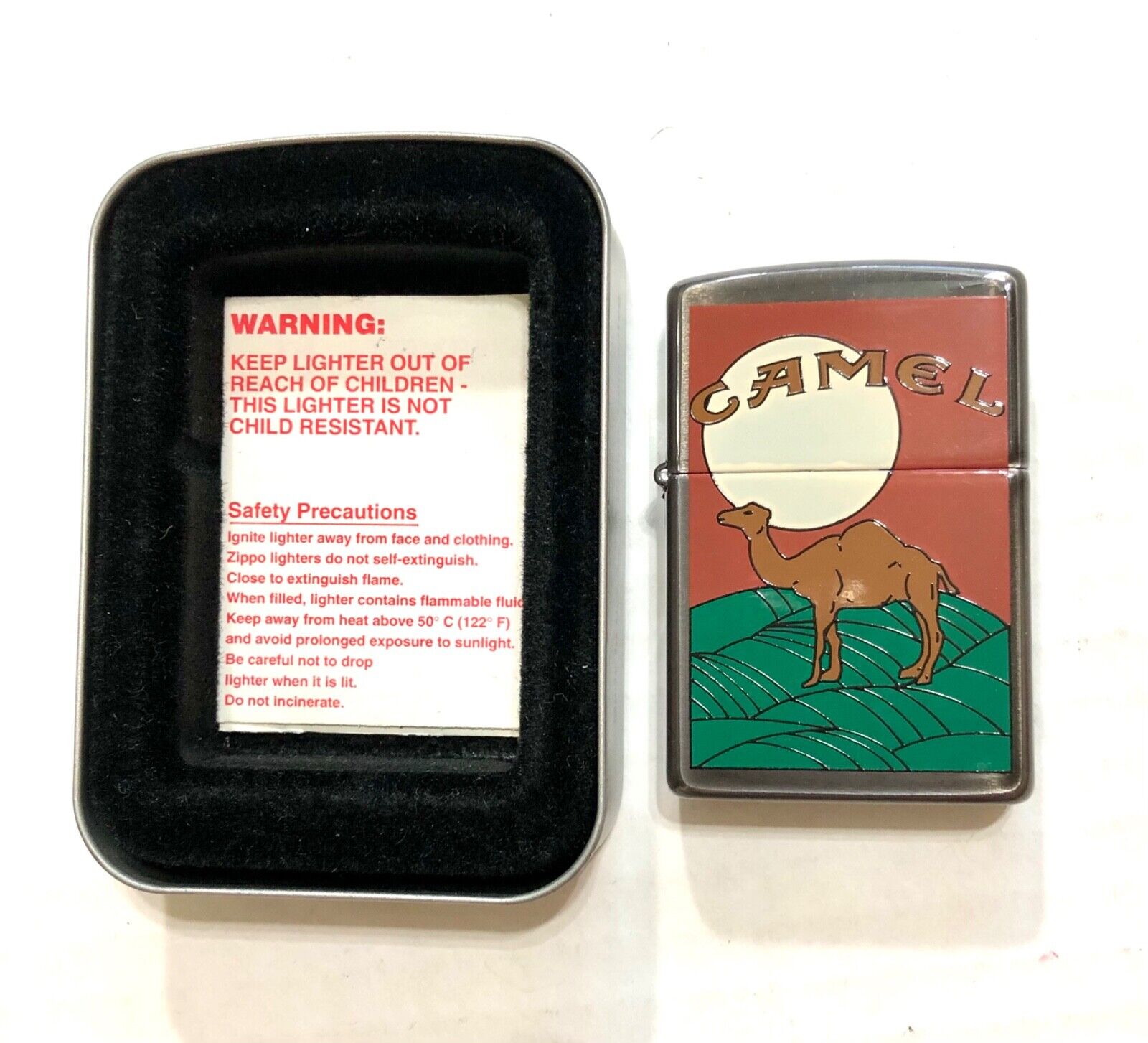 Zippo Camel and the Moon: paint scratch at back. New.