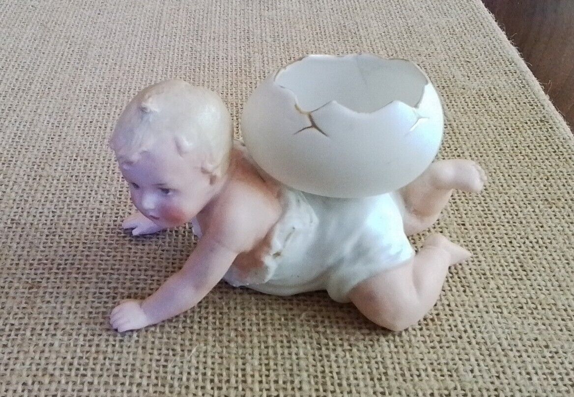 RARE GEBRUDER HEUBACH EASTER BABY WITH EGG SHELL ON BACK