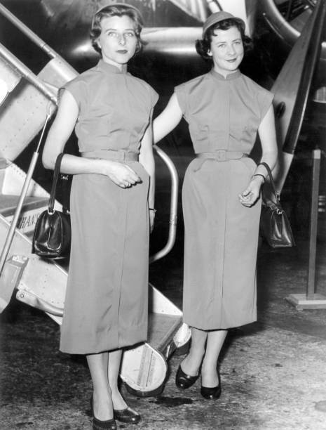 Two stewardesses present summer clothes Lufthansa airport Frankfur- 1955 Photo