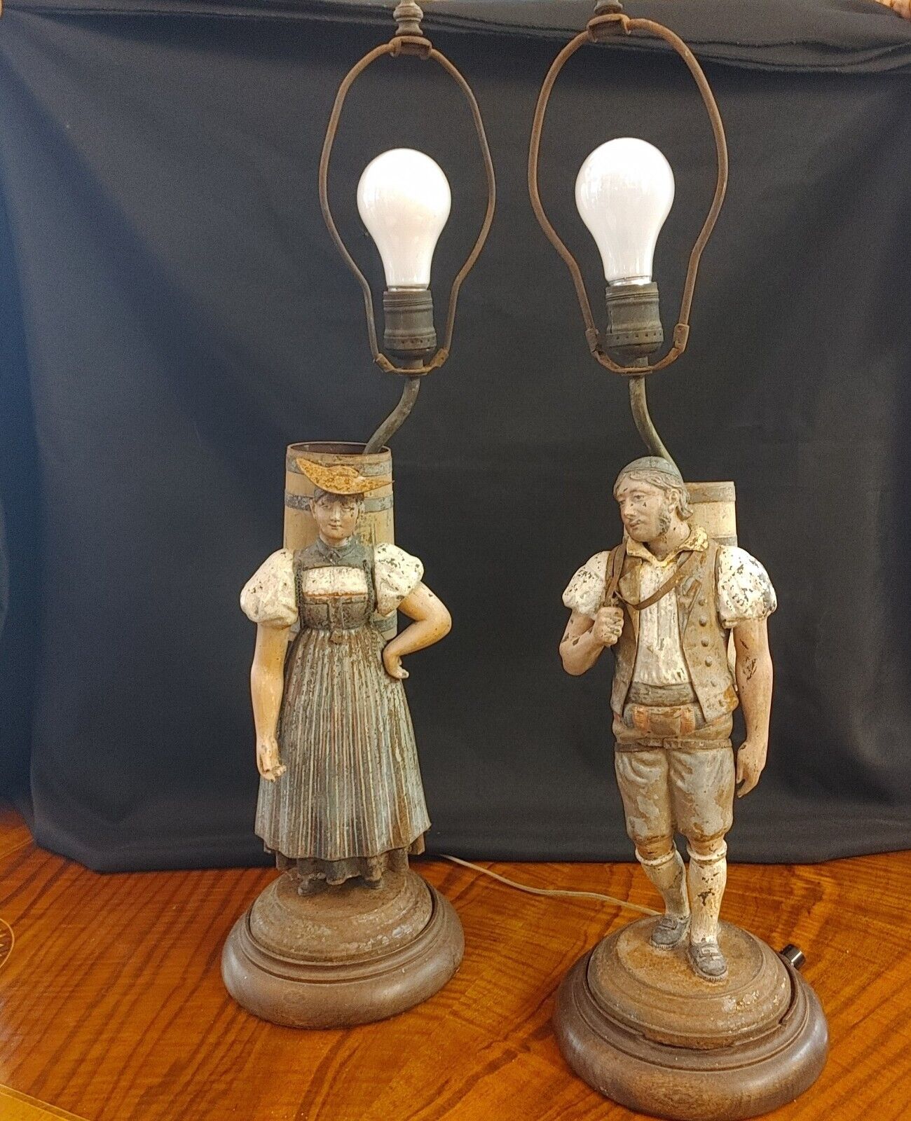 Painted Tin Figural Pair of Lamps of a Bavarian Couple