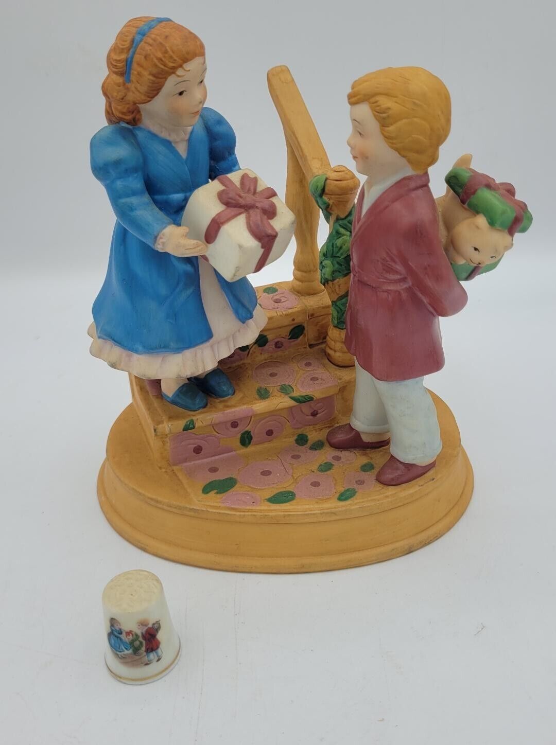 AVON Christmas Memories CELEBRATING THE JOY OF GIVING Figurine 4th Edition 1984
