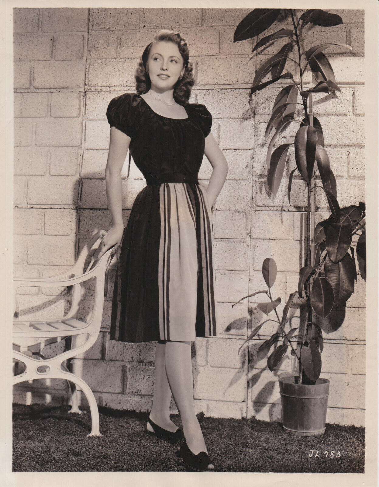 1945 Press Photo Actress Joan Leslie Models Play Dress in \