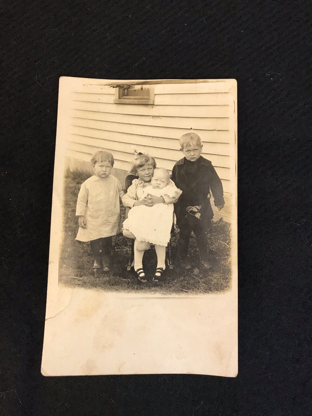 Antique Real Photo Postcard RPPC Four Children Siblings c1900 Outside Picture