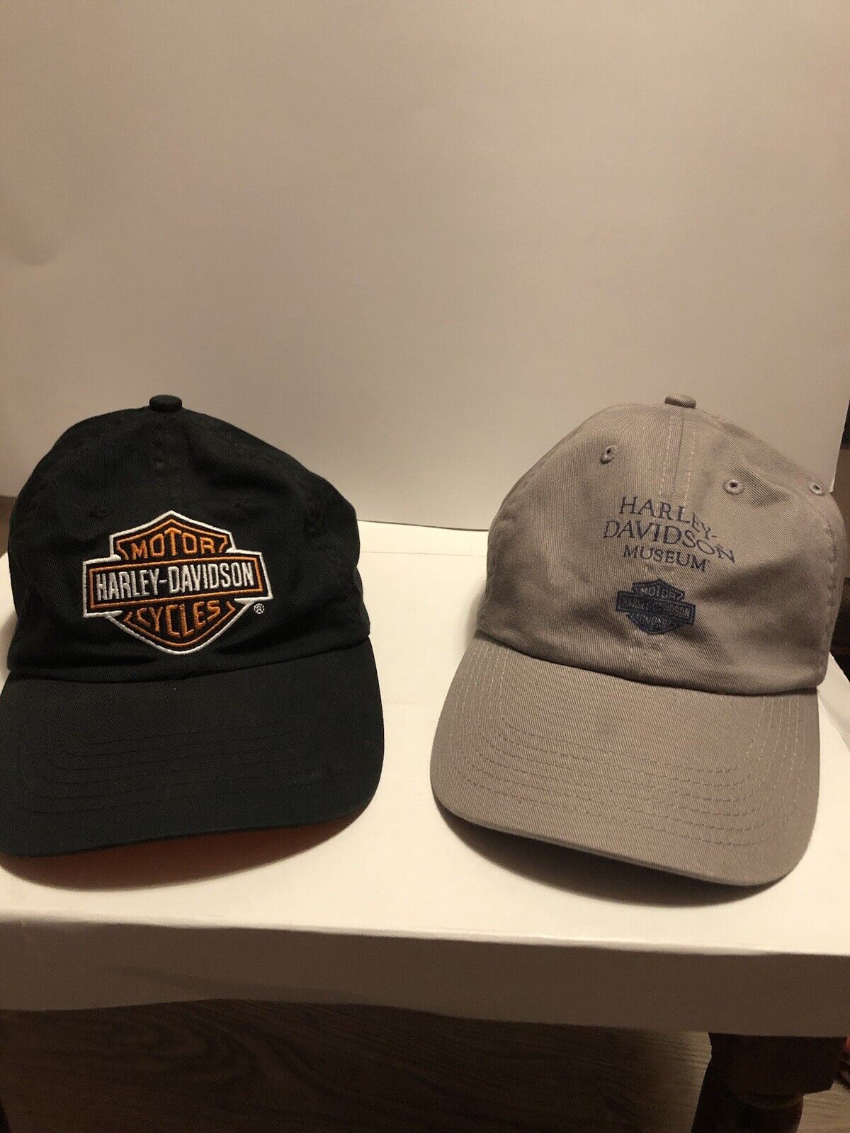 Two Harley Davidson Hats One Is From The Harley Davidson museum