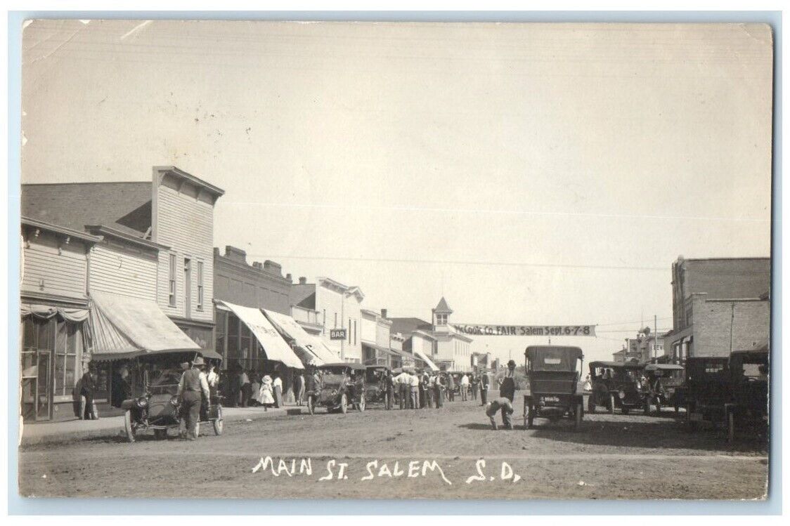 1911 Main Street Bar Fair Banner View Salem South Dakota SD RPPC Photo Postcard