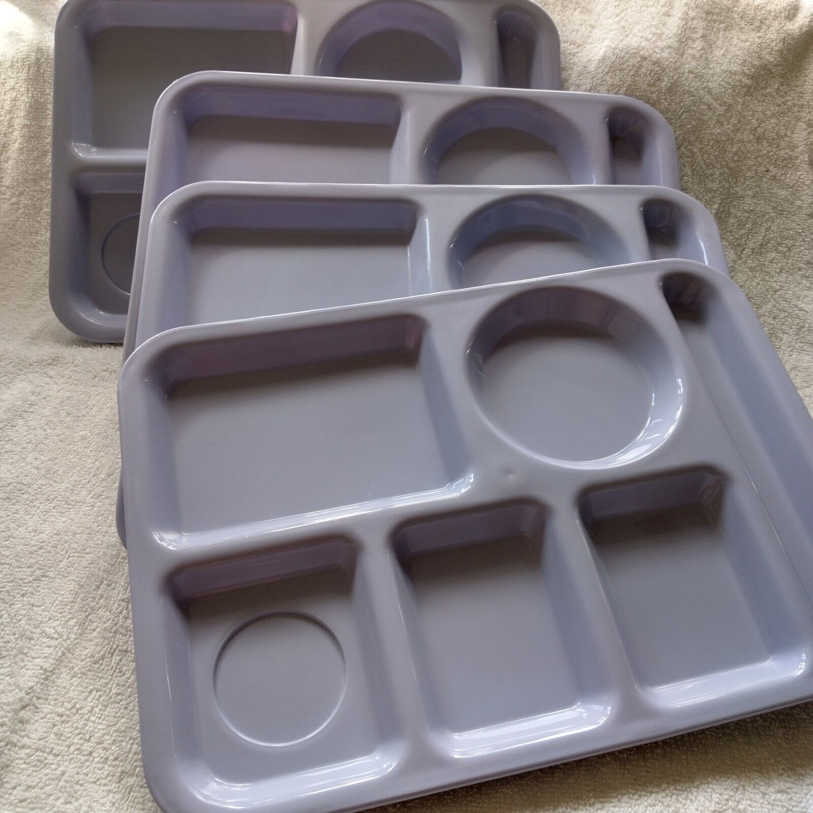Four SiLite plastic trays, Chicaco, Il, light blue, approx 14\