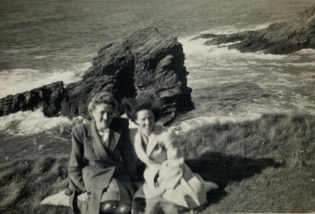 Two Women Sitting On Grass Above Rocky Coastline B&W Photograph 2.25 x 3.25