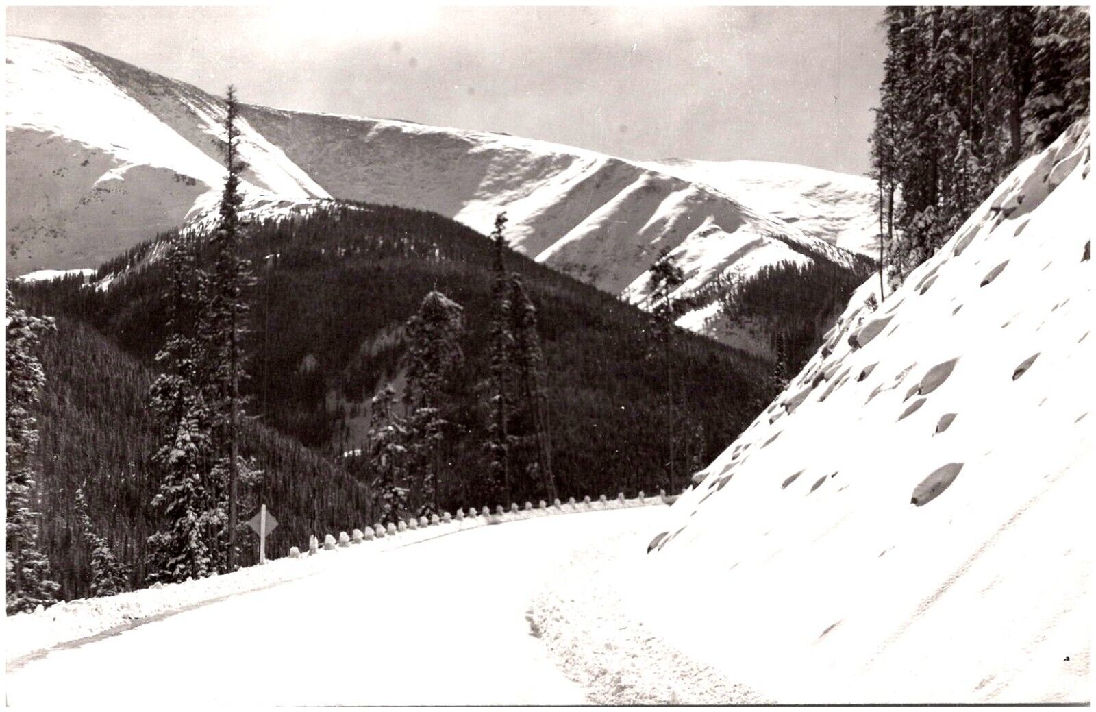 RPPC Berthoud Pass Highway in Winter Colorado Snow Mountains Vintage Postcard