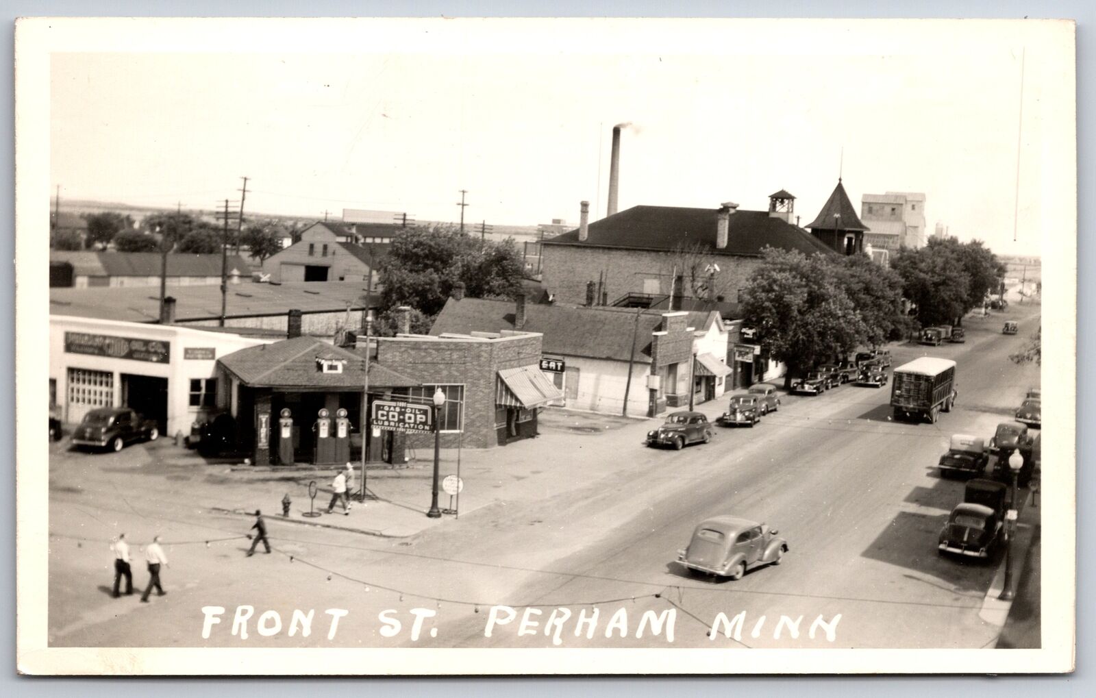 Perham MN Front St Co Op Oil Lubrication Gas Station~Elevators~Semi~RPPC 1940s