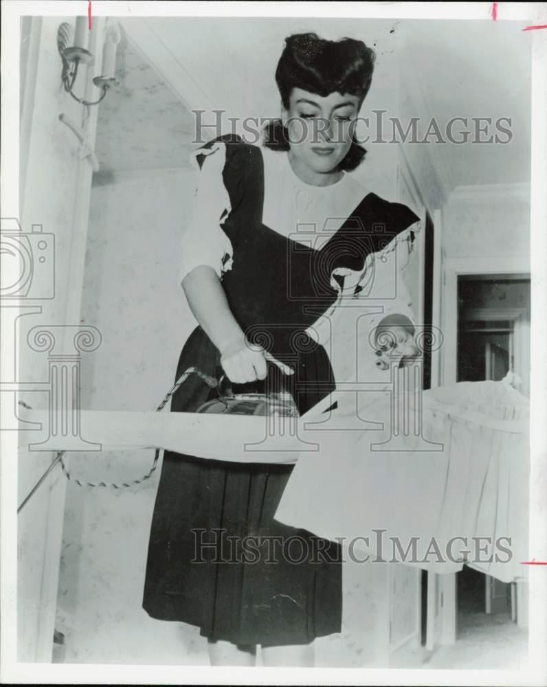 1983 Press Photo Actress Joan Crawford, Ironing - hpp38542