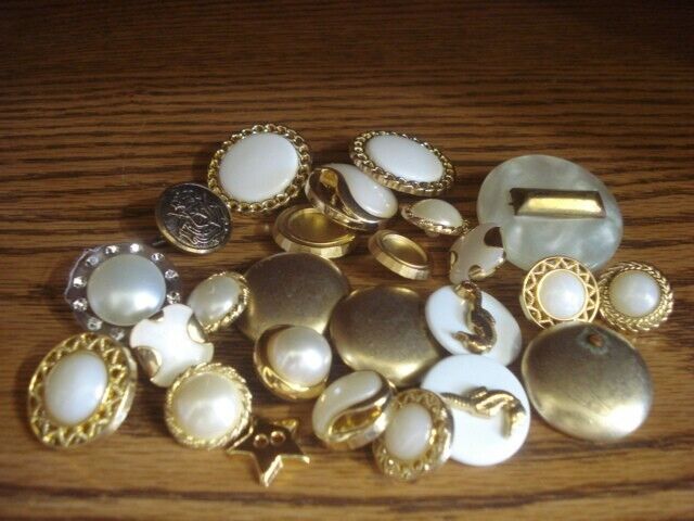 twenty five  vintage buttons gold tone and white