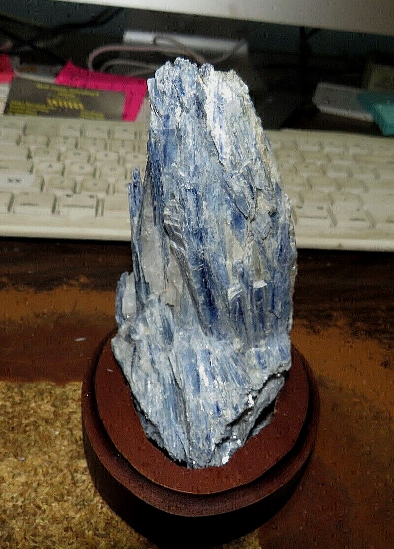 GORGEOUS LARGE SPECIMEN OF BLUE KYANITE IN A WOOD STAND