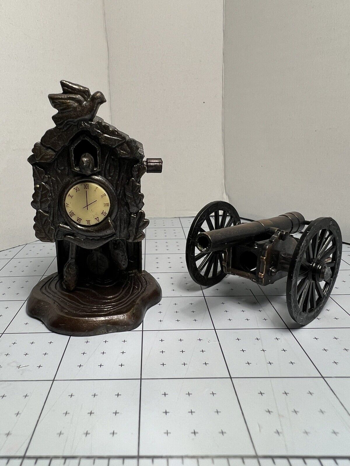 Lot Of 2 Vtg Pencil Sharpeners Coo-Coo Clock & Cannon Bronze Die Cast Miniature