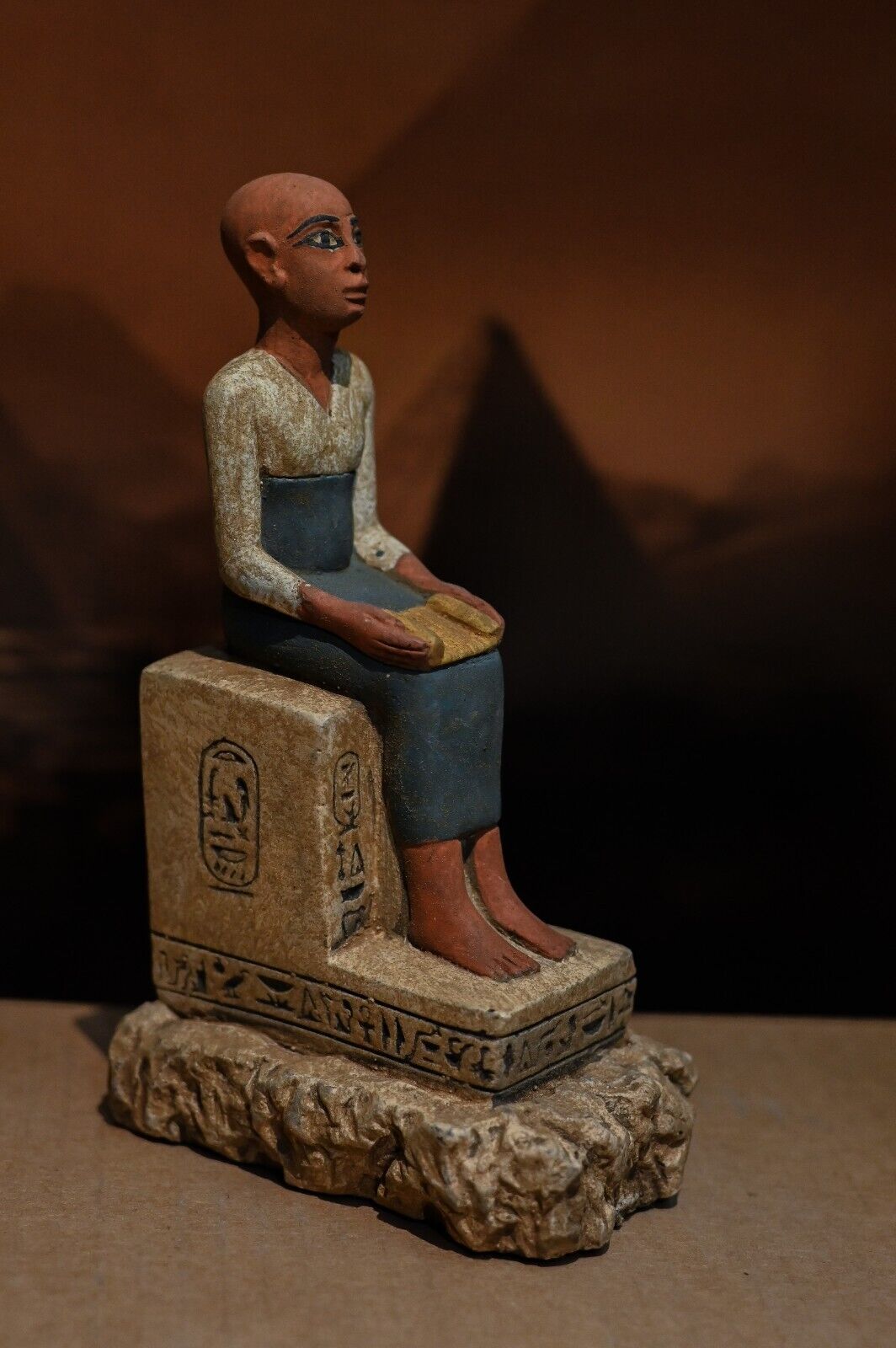 Egyptian art Seated statue of Imhotep god of midicine open a papyrus scroll