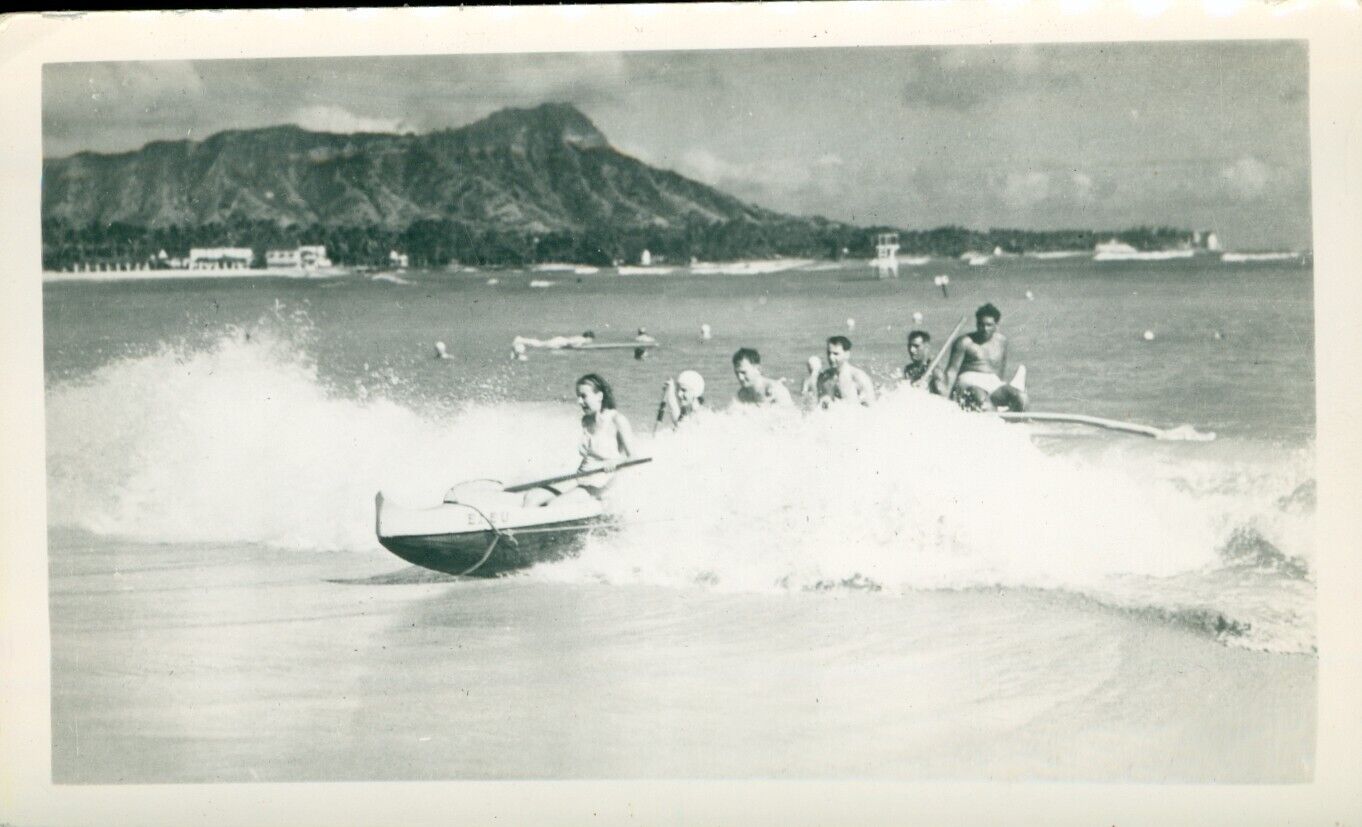 1930s Waikiki, Diamond Head, Hawaii Photo riding a wave in a outrigger canoe