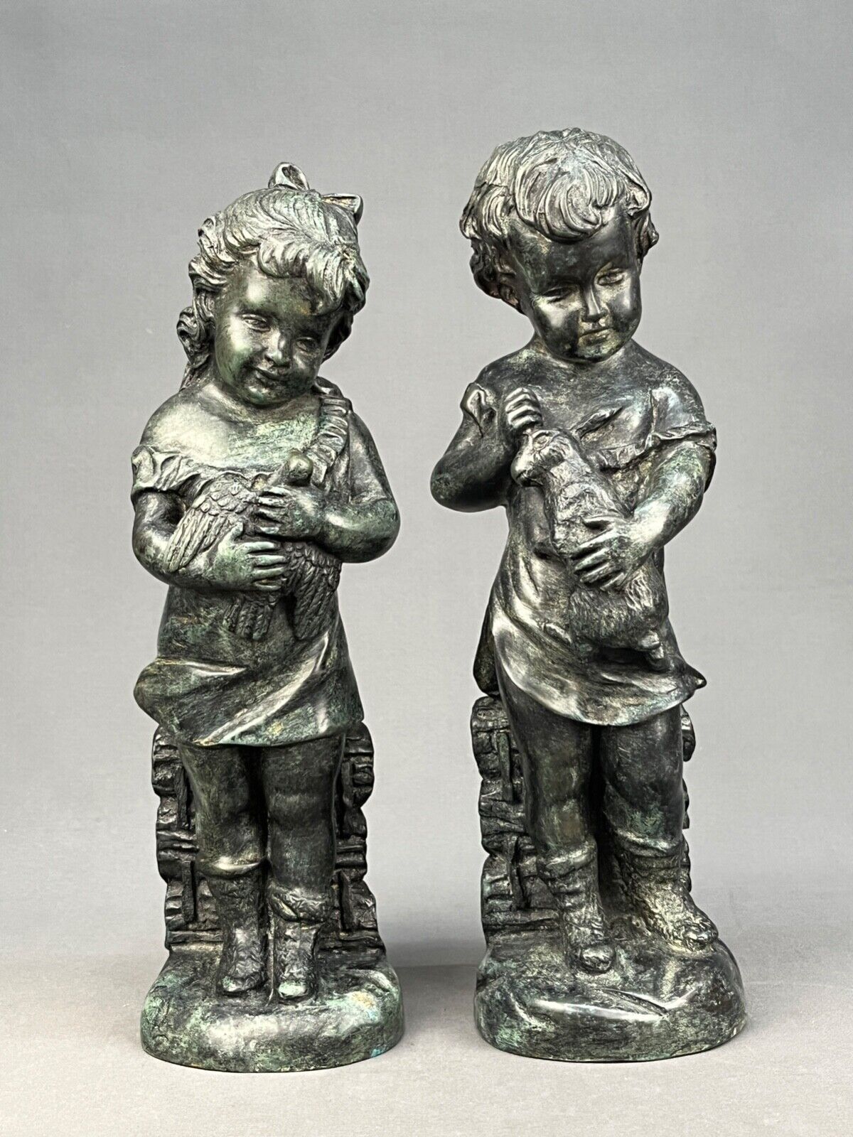 Pair of Maitland Smith Bronzed Sculptures of Young Boy & Girl; Mint