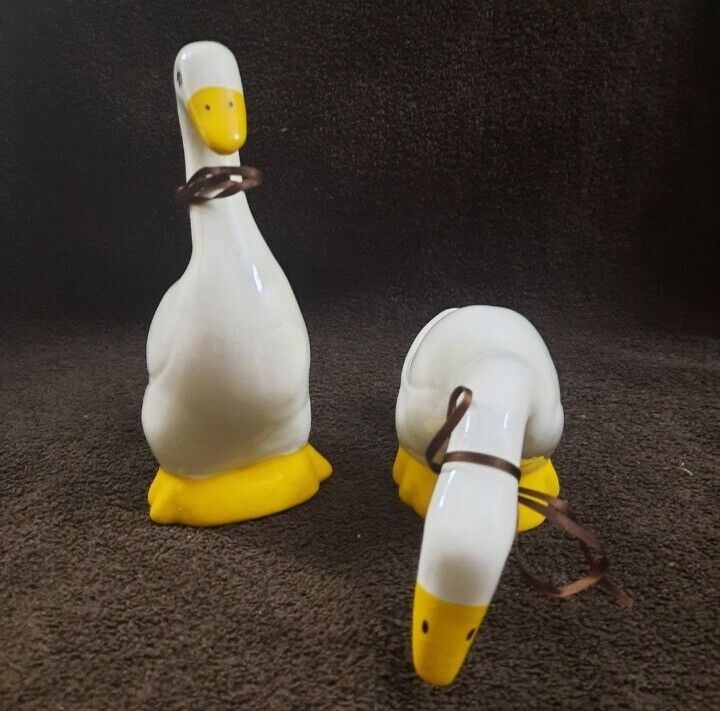 Pair Of Ceramic Geese w/ Ribbon Around Their Necks