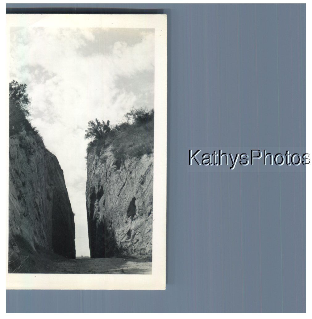 FOUND B&W PHOTO G_1441 A NARROW SPACE BETWEEN TWO ROCK FORMATIONS